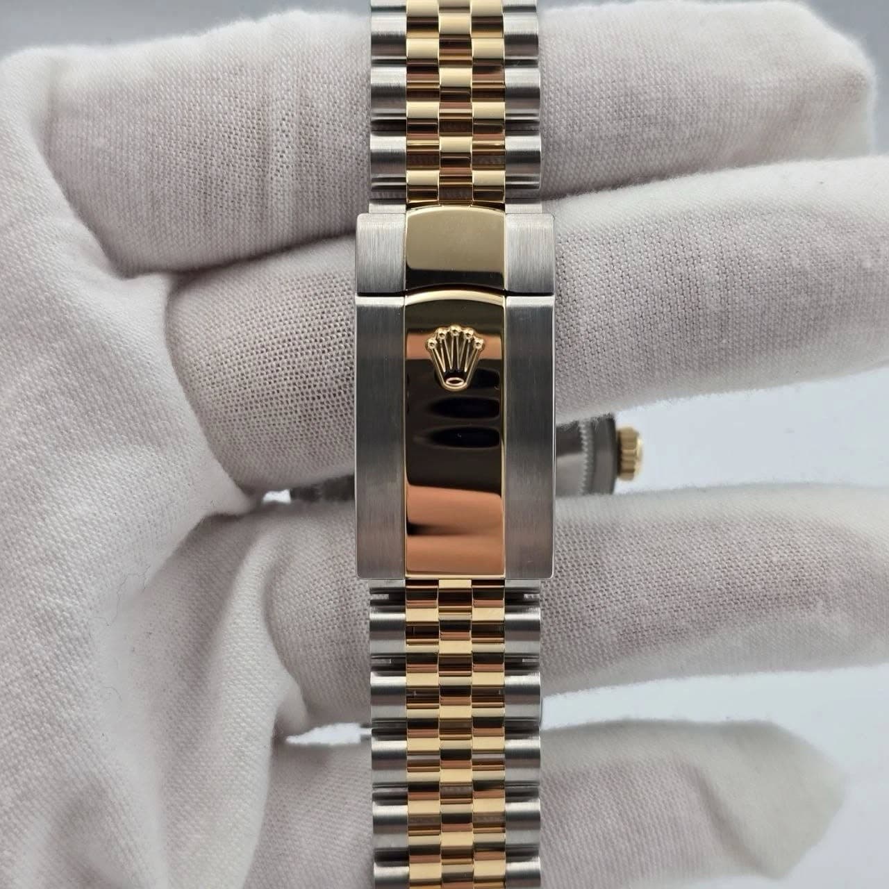 May be an image of wrist watch