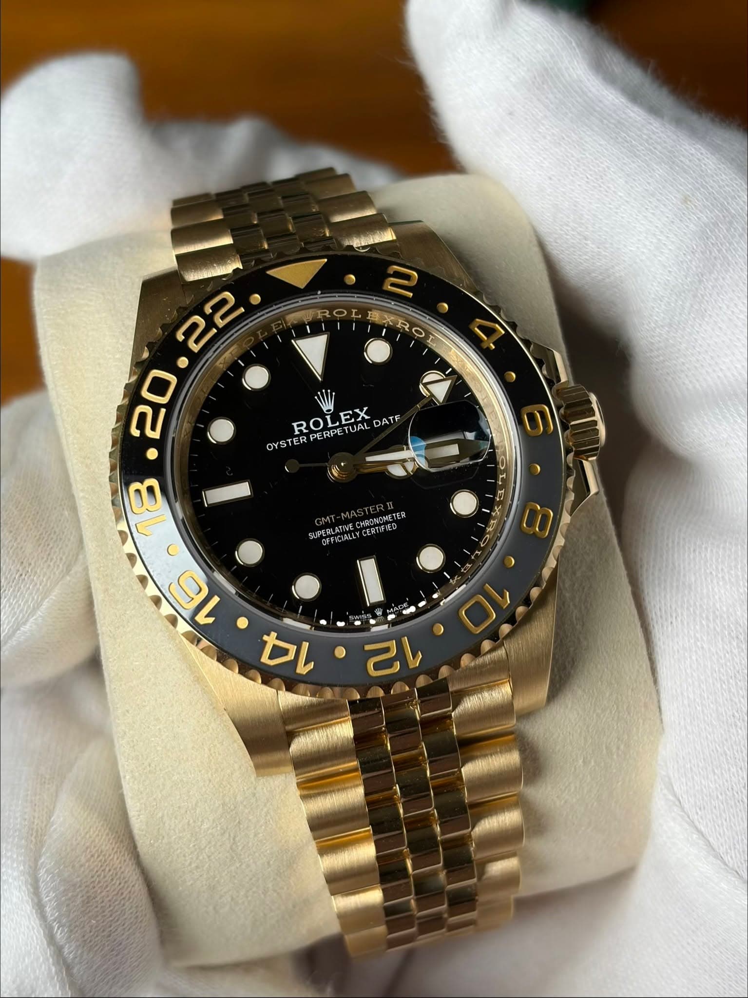 May be an image of wrist watch and text