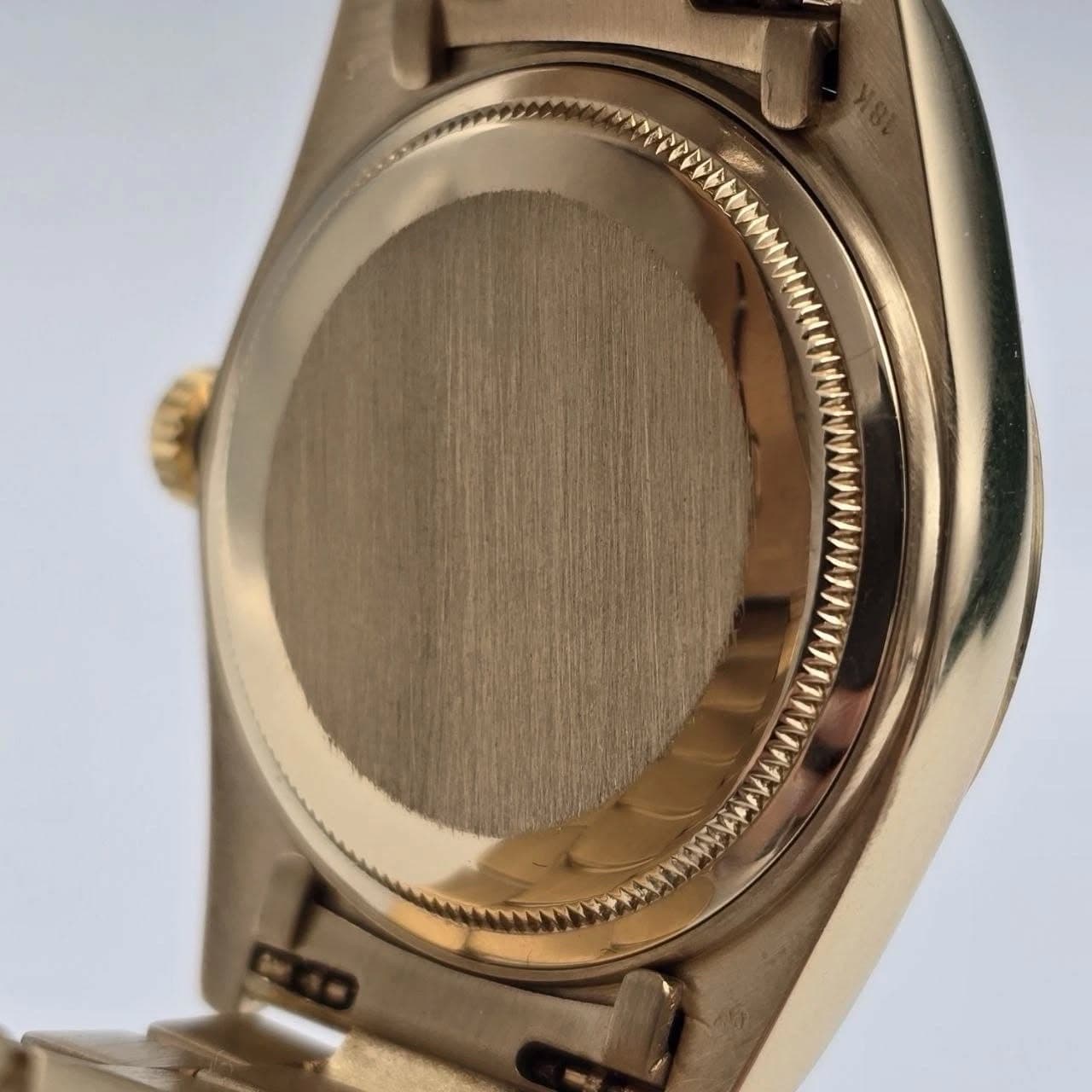 May be an image of wrist watch
