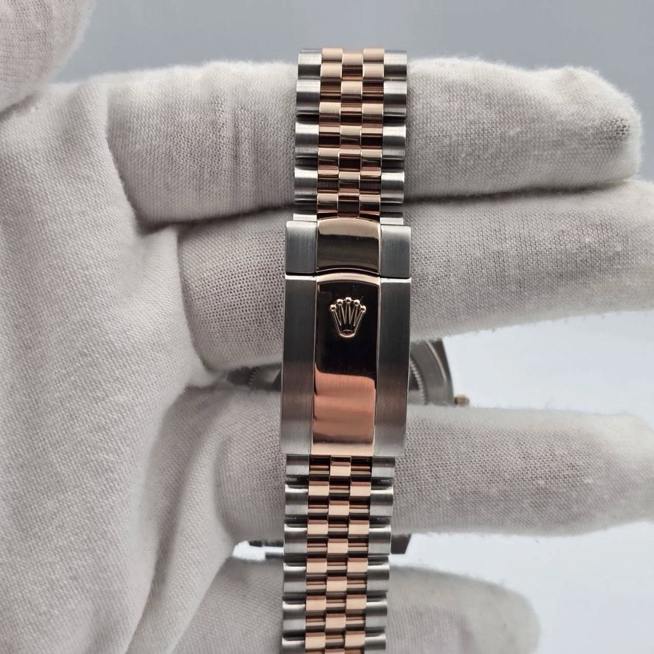 May be an image of wrist watch