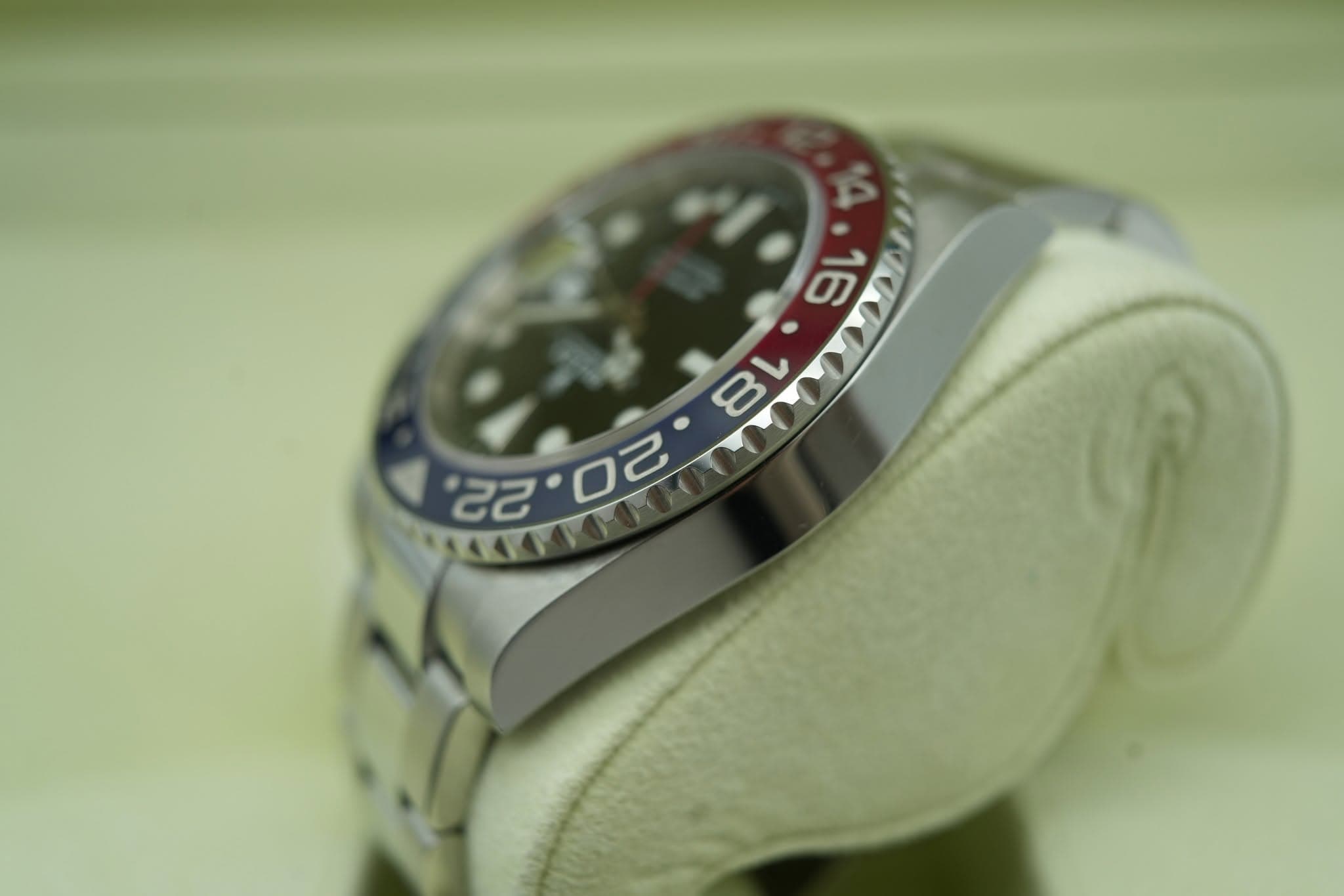 May be an image of wrist watch and text