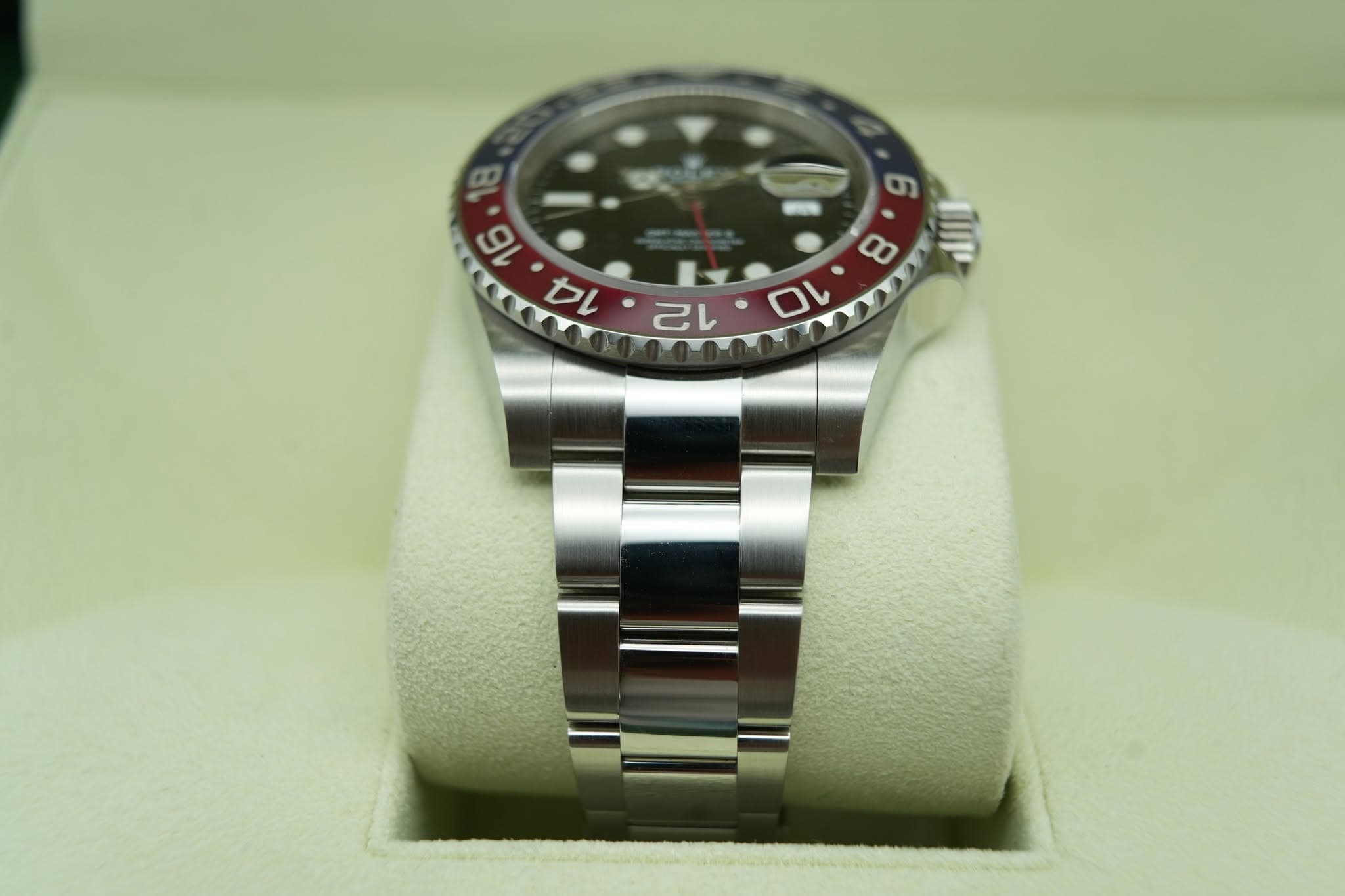 May be an image of wrist watch and text