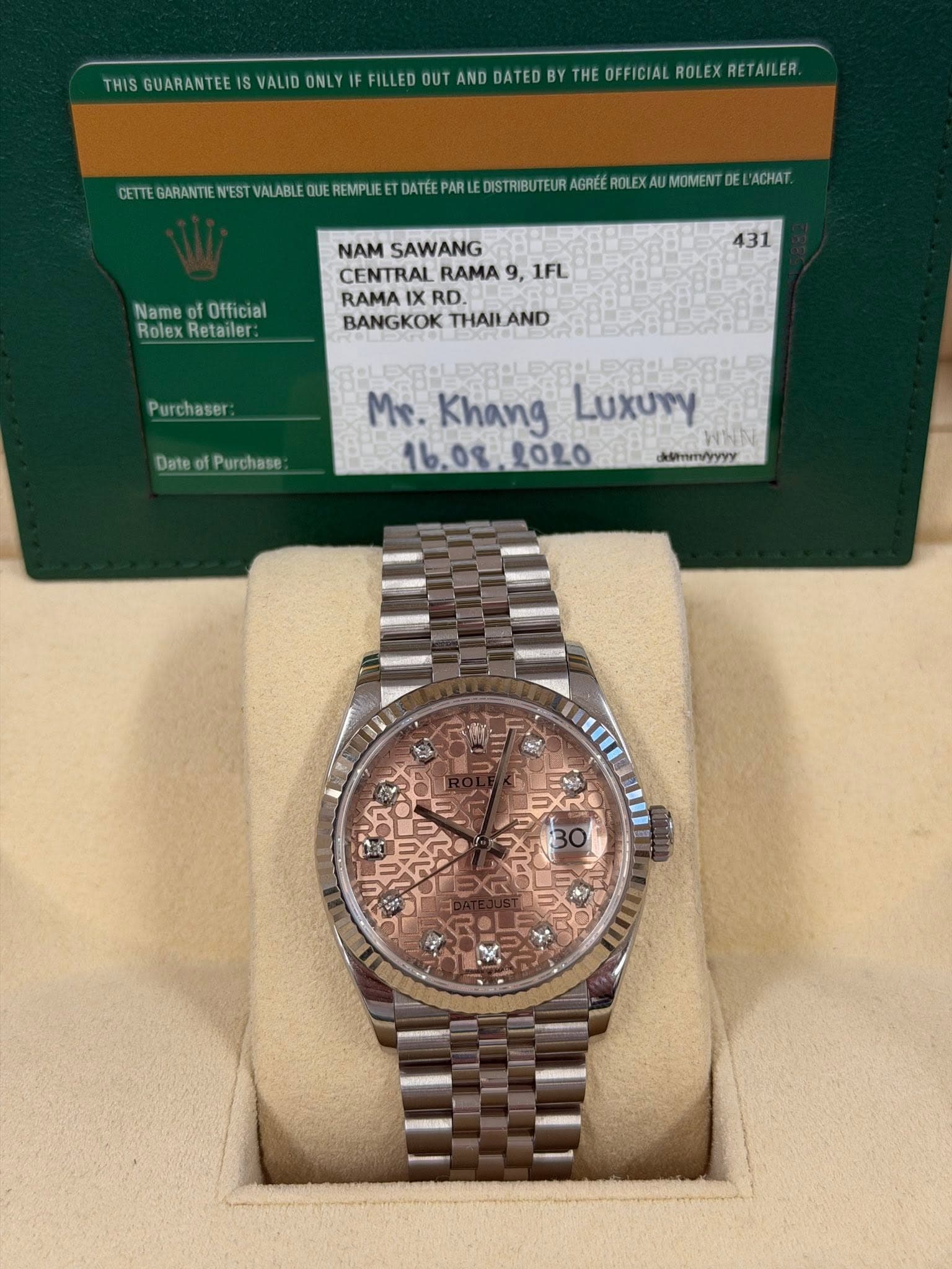 May be an image of wrist watch and text