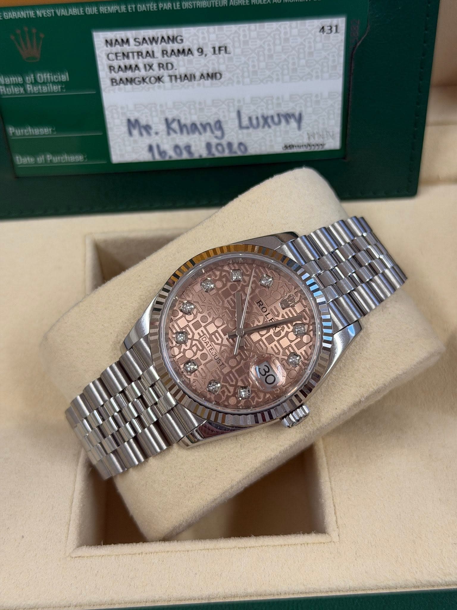 May be an image of wrist watch and text
