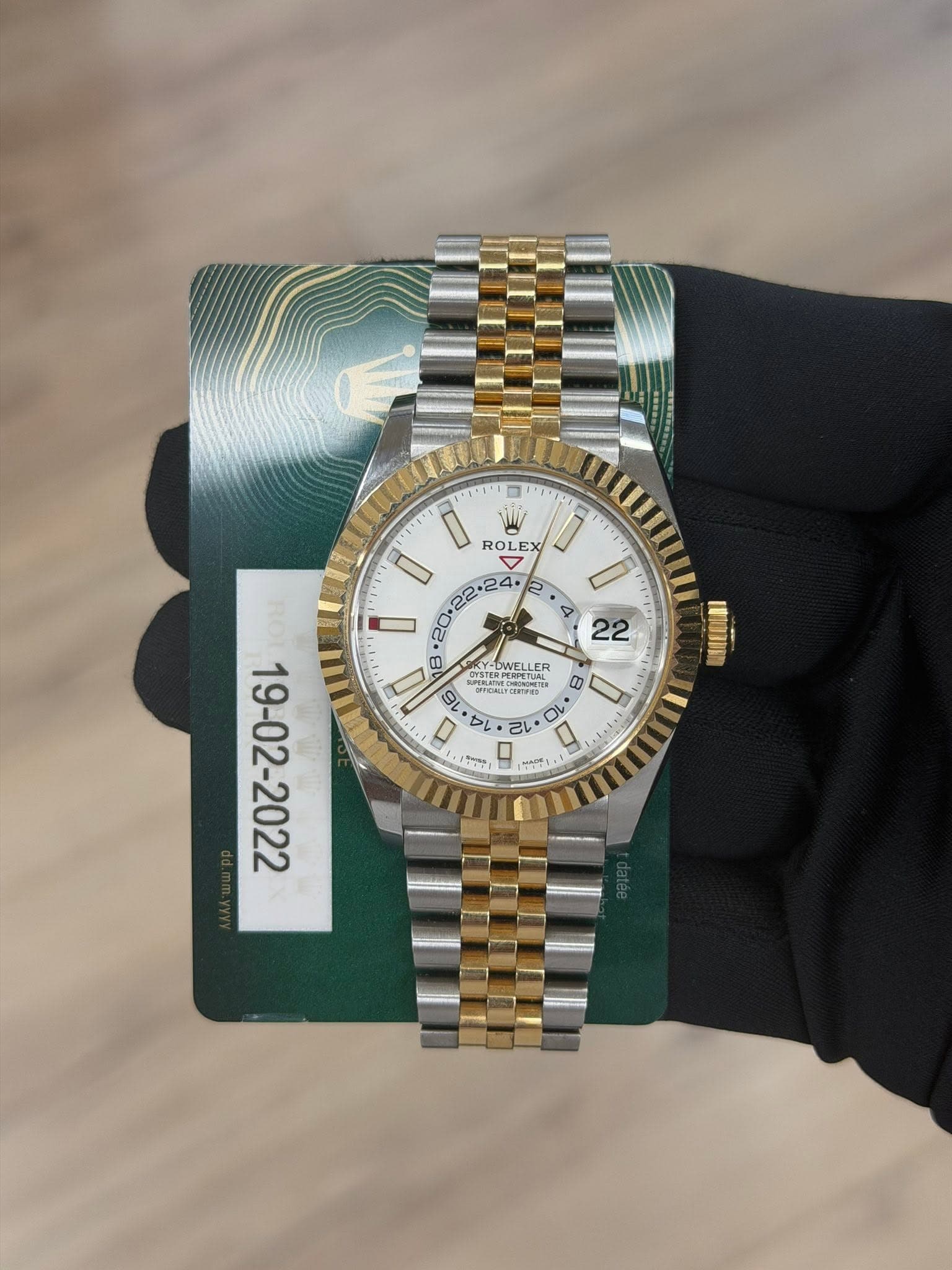 May be an image of wrist watch and text