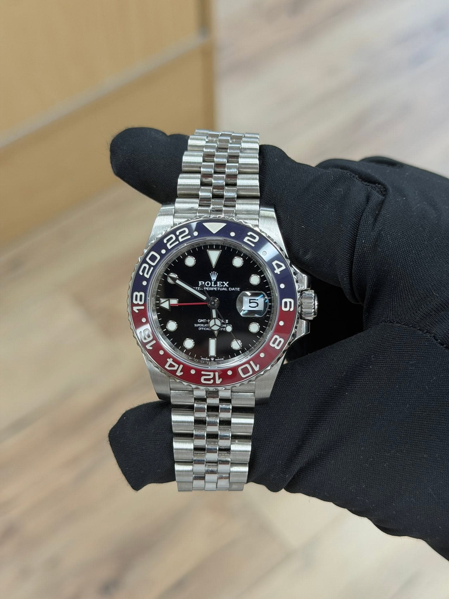 May be an image of wrist watch and text