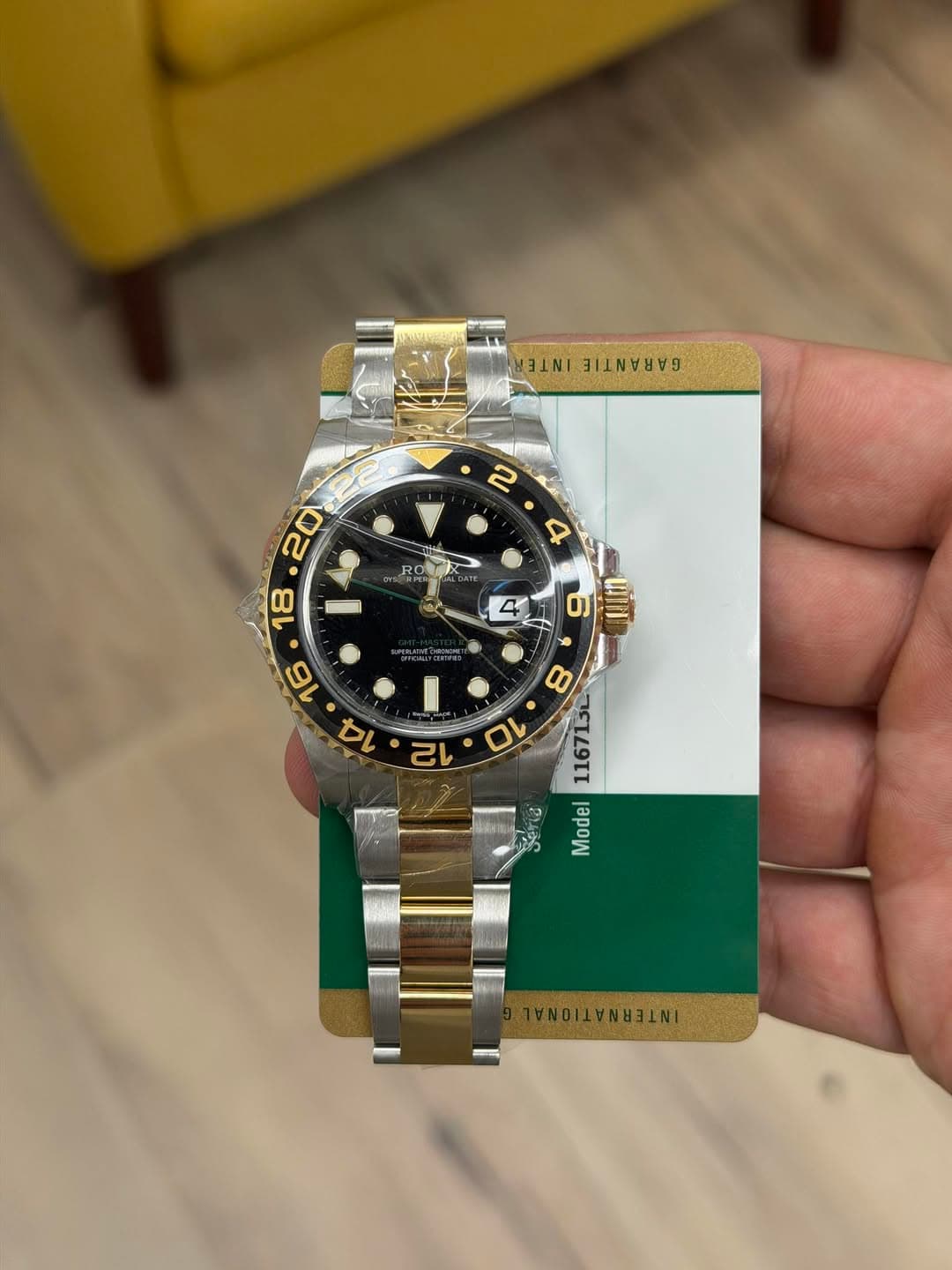 May be an image of wrist watch and text