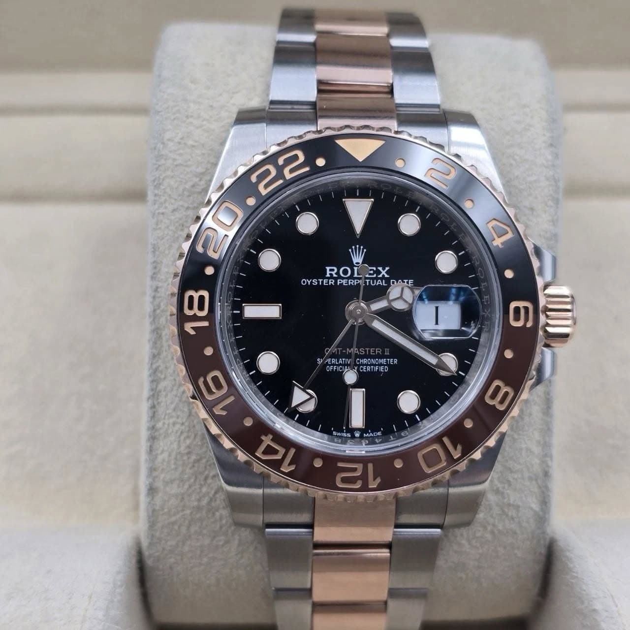 May be an image of wrist watch and text