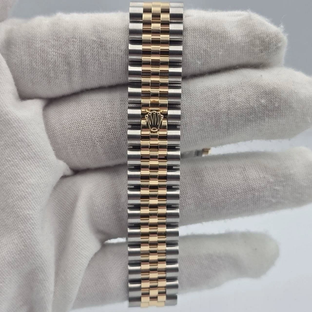 May be an image of wrist watch