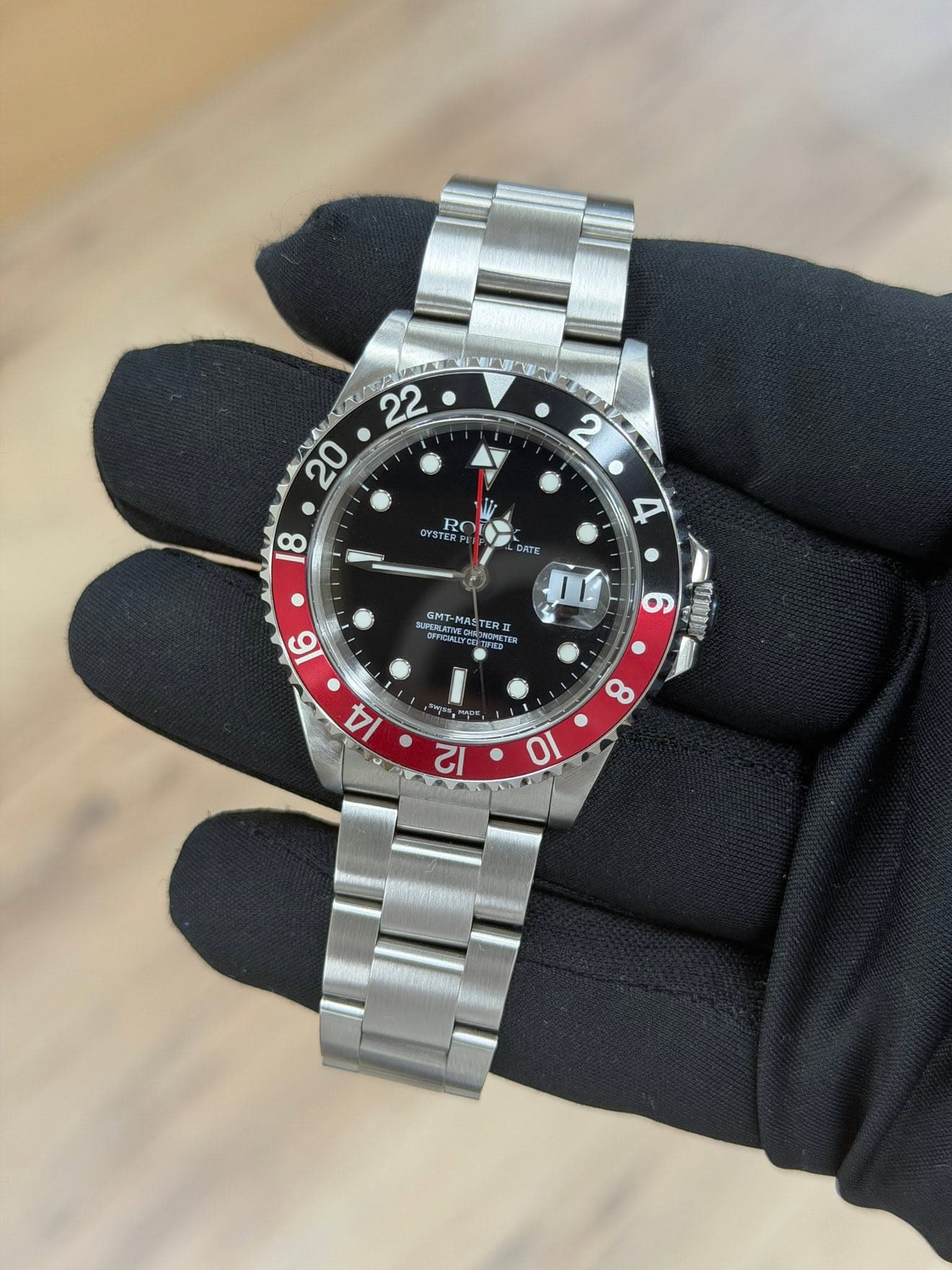 May be an image of wrist watch and text