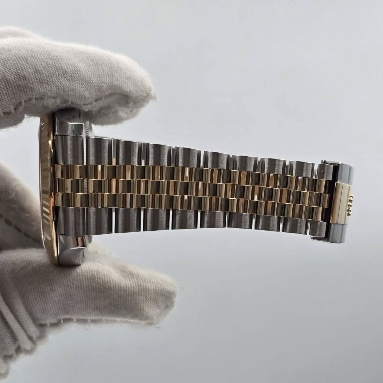 May be an image of wrist watch