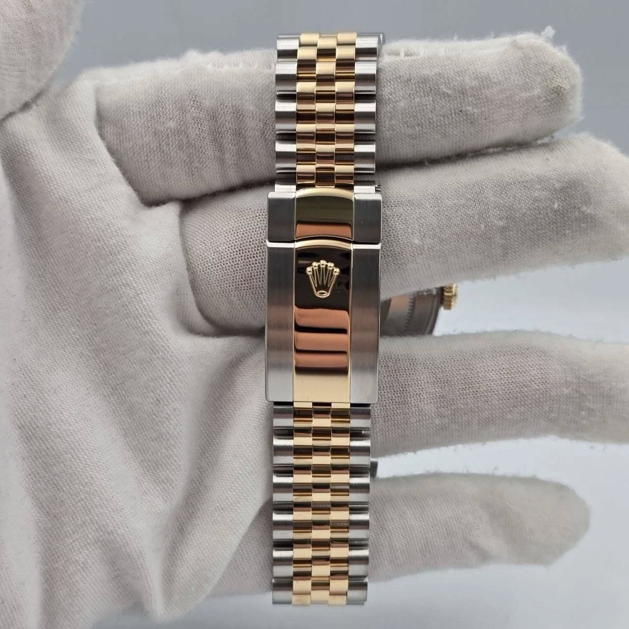 May be an image of wrist watch