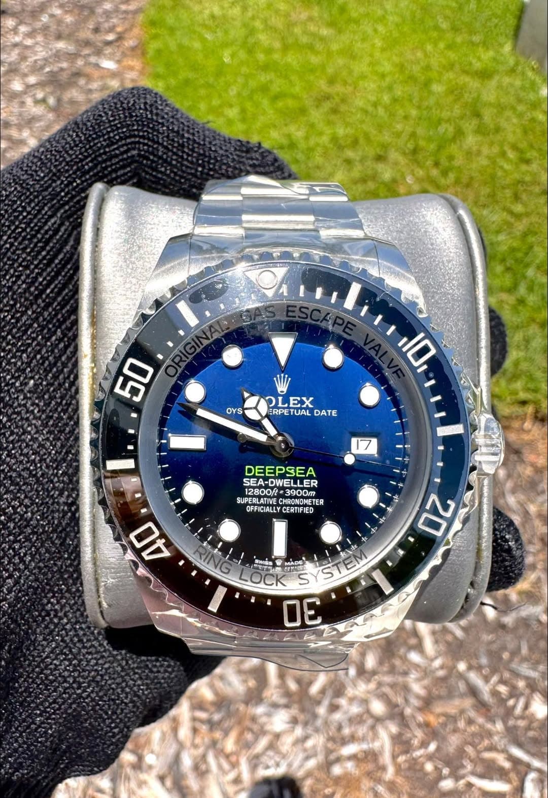 May be an image of digital watch and text that says '50 OYS 10 LEX ERPETU RPETUAL DATE 17 DEEPSEA ELLER 12800ft SEA-DWELLER ១០០០០០០ ተልተልል =3900m SUPERLATIVE CHRONOMET CHRONOMET ER…