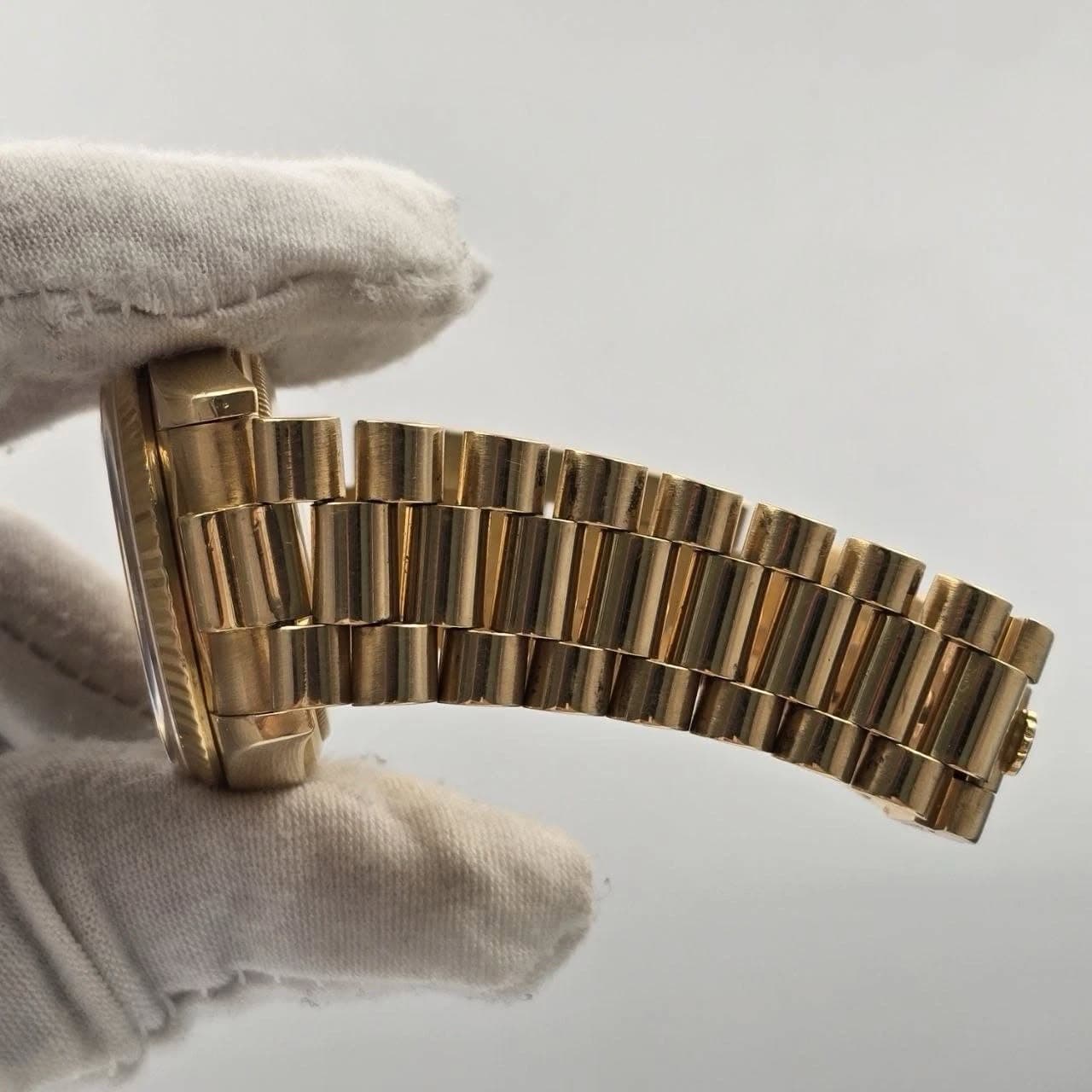 May be an image of wrist watch