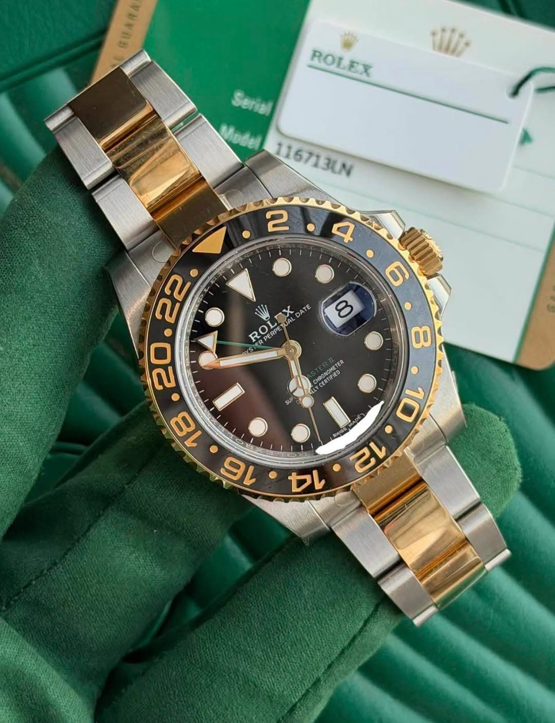 May be an image of wrist watch and text that says 'E ROLEX ROLEX Serial Model 116713UN 2 4 6 RO i ROLDX X ATE OERPETUAL RPETUAL 8 8 Y ERONOMETER TER CERTIFIED '