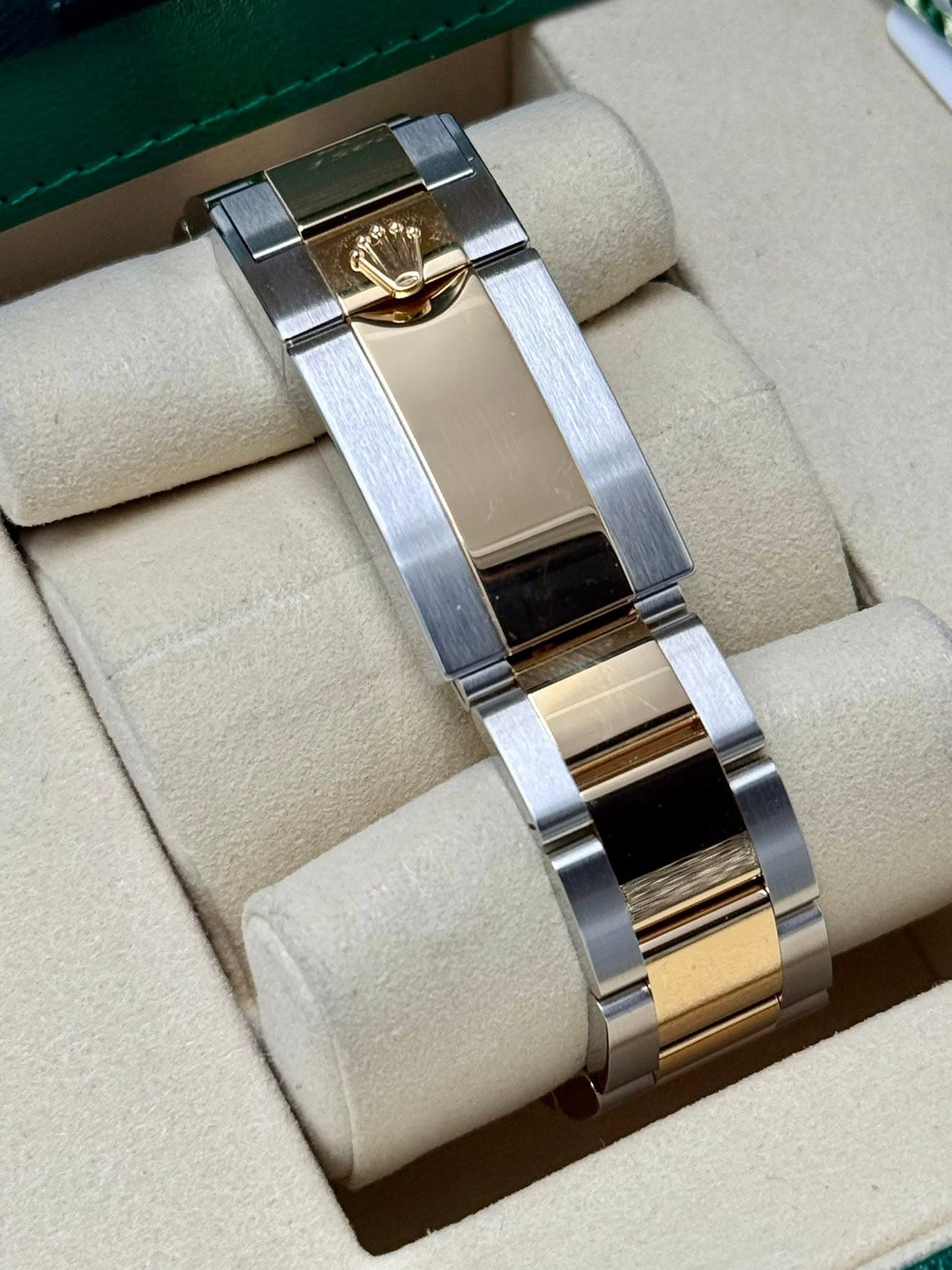 May be an image of jewelry and wrist watch