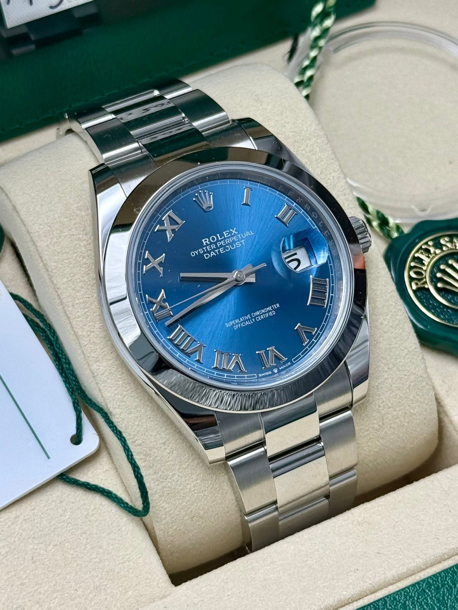 May be an image of wrist watch and text that says 'I שי XI TII STERPERPETU OYSTERPESUSTUAL EDDEDOA ROLEX UAL EX OYS YSTERP DATE DATEJUS ATEJUST JUST 5 X CHRONONETE CERTIFIED…