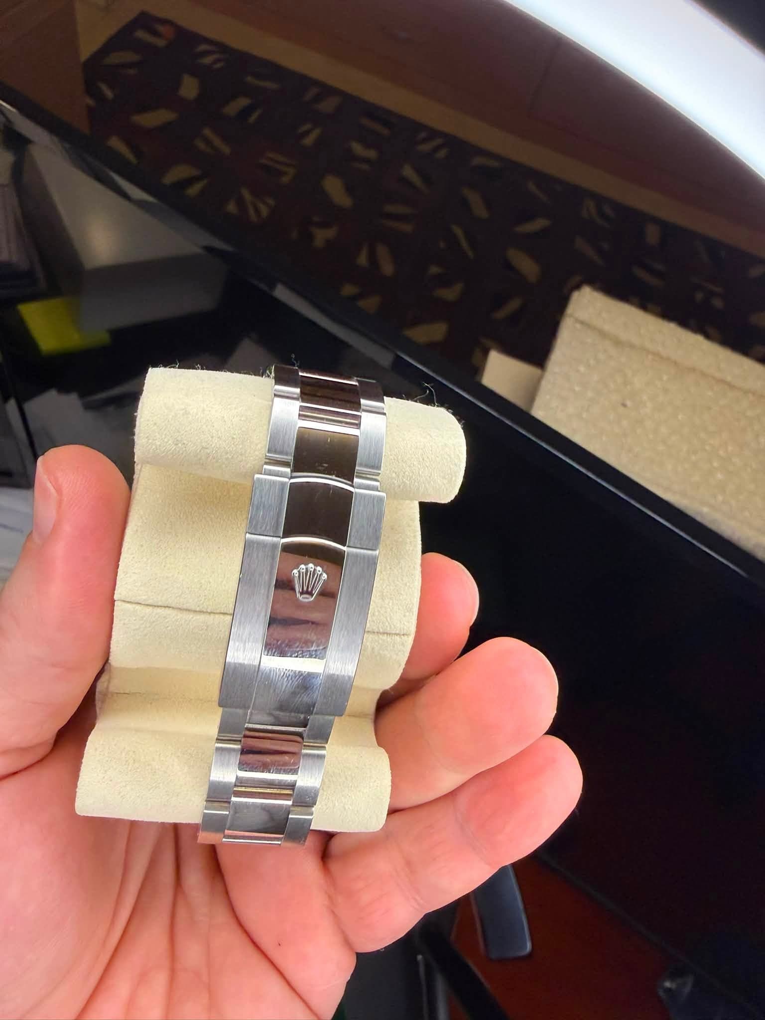May be an image of wrist watch