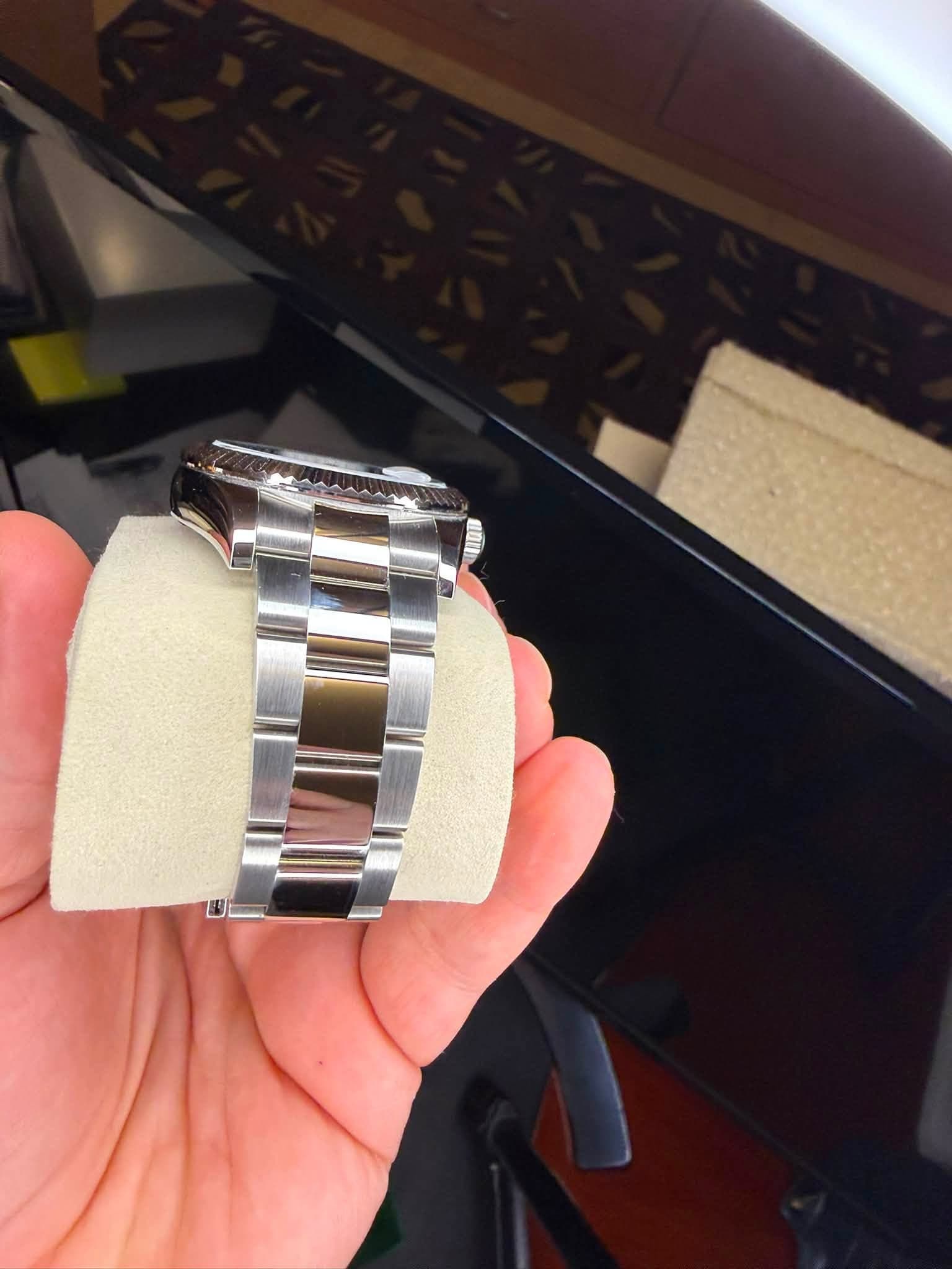 May be an image of wrist watch
