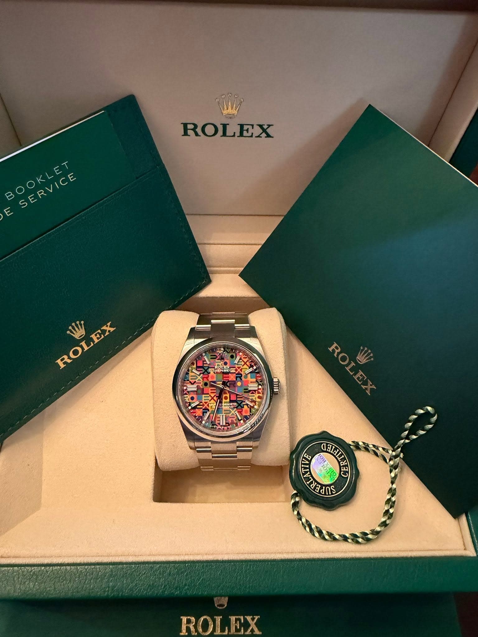 May be an image of wrist watch and text