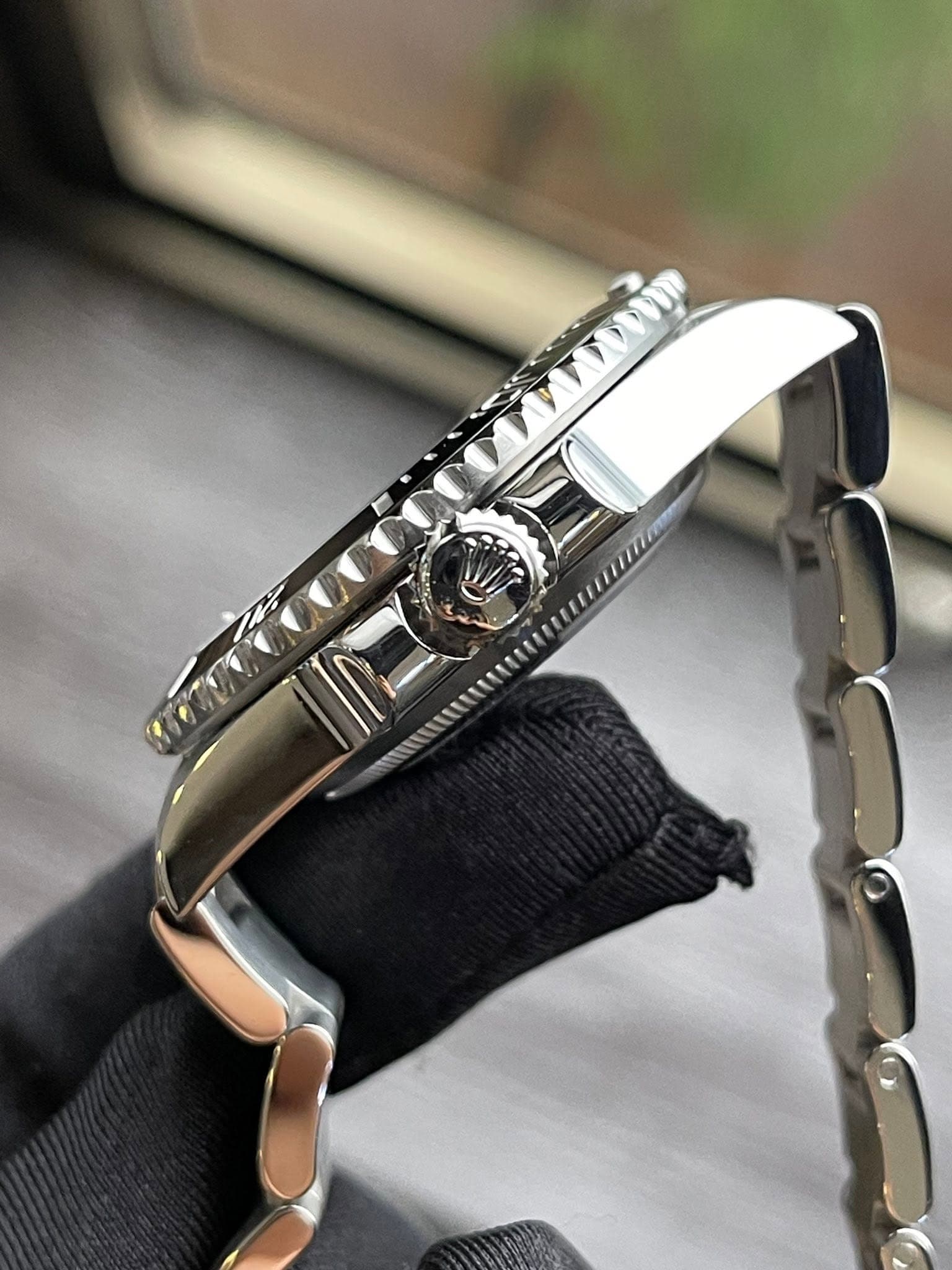 May be an image of wrist watch and text
