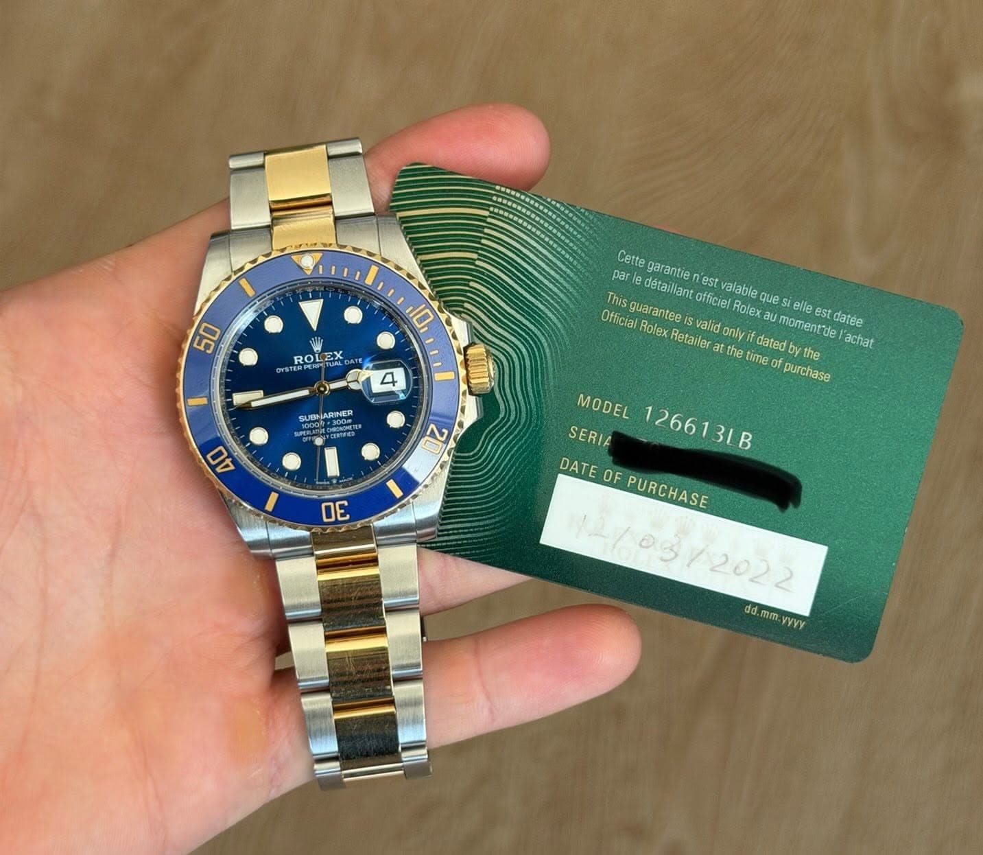 May be an image of wrist watch and text that says '50 10 ROL ROLEH EX OYSTE 4 Cette garantie par This detaillant est valable OfficialRolex Official guarantee Officie Rolex que we…