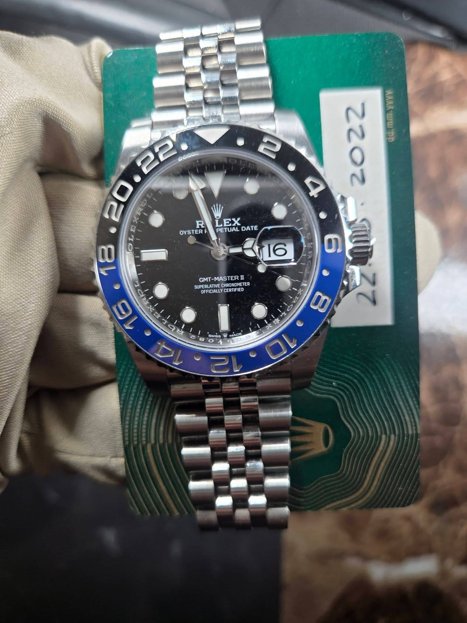May be an image of wrist watch and text