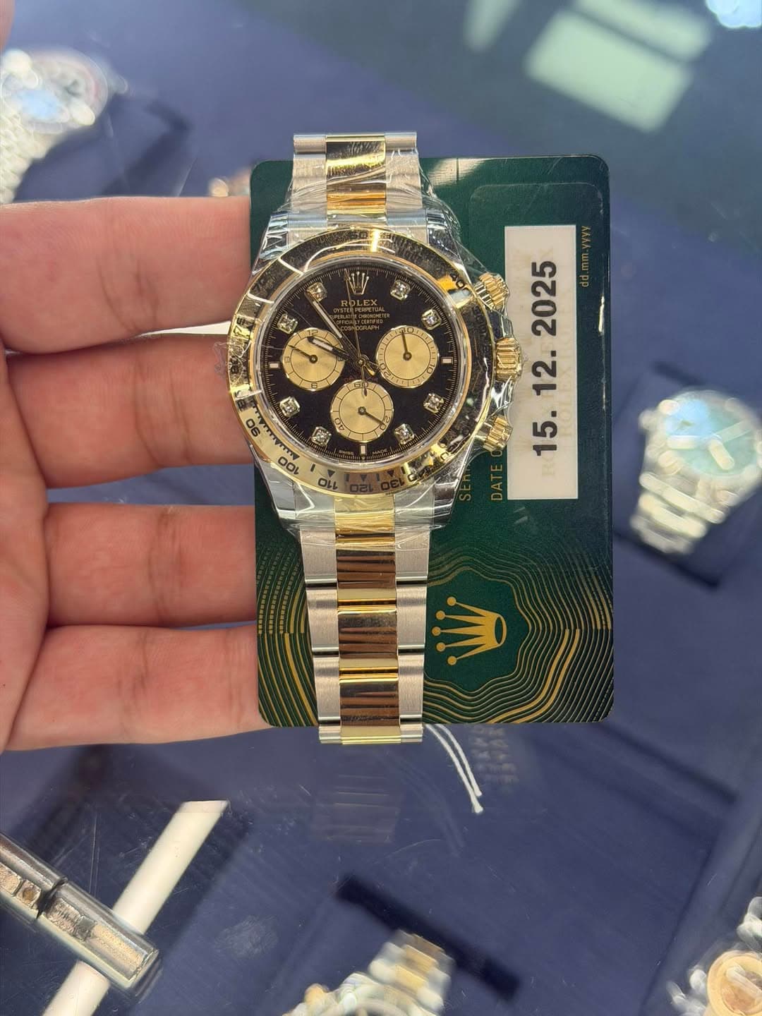 May be an image of wrist watch and text