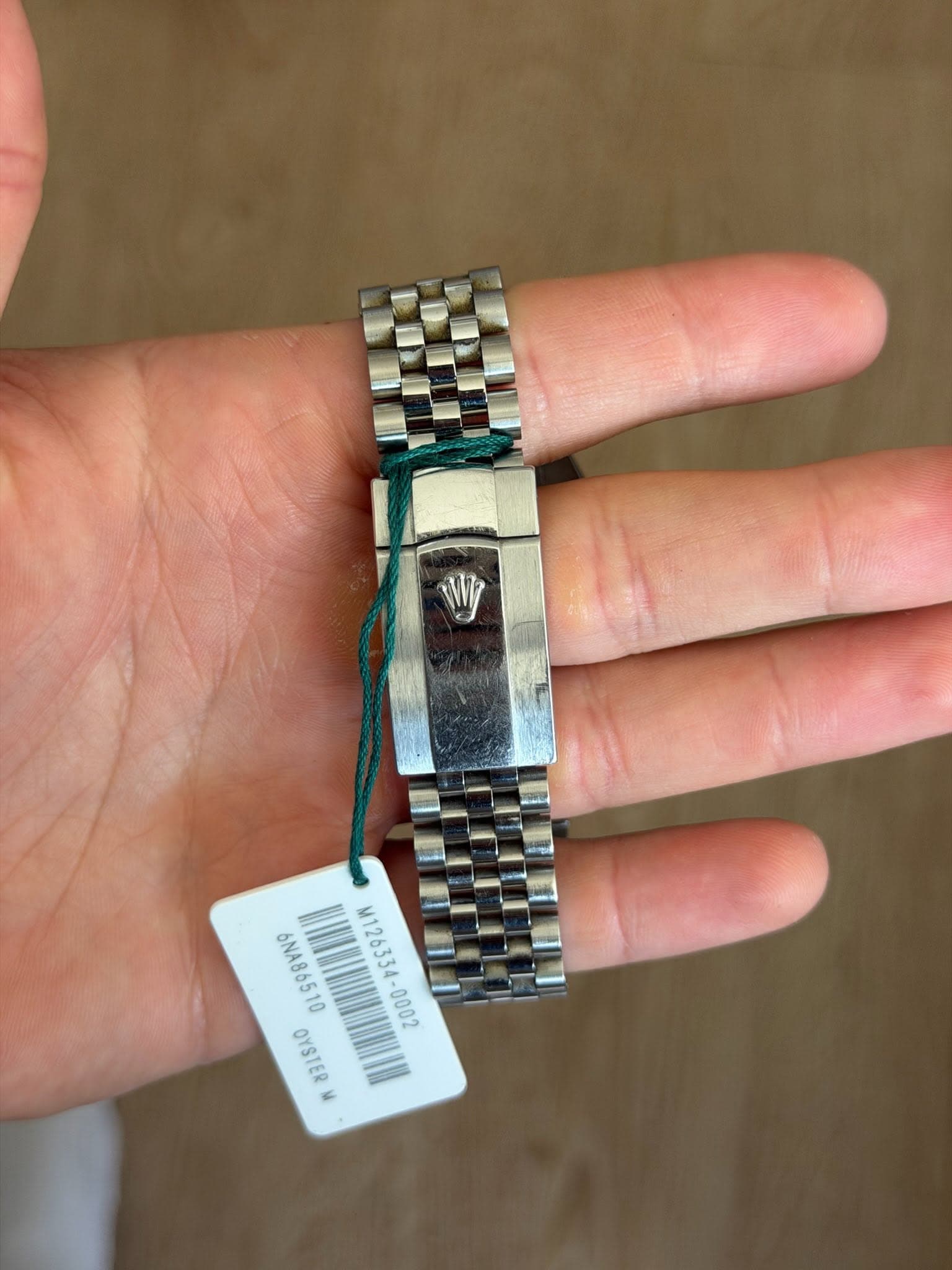 May be an image of digital watch and text