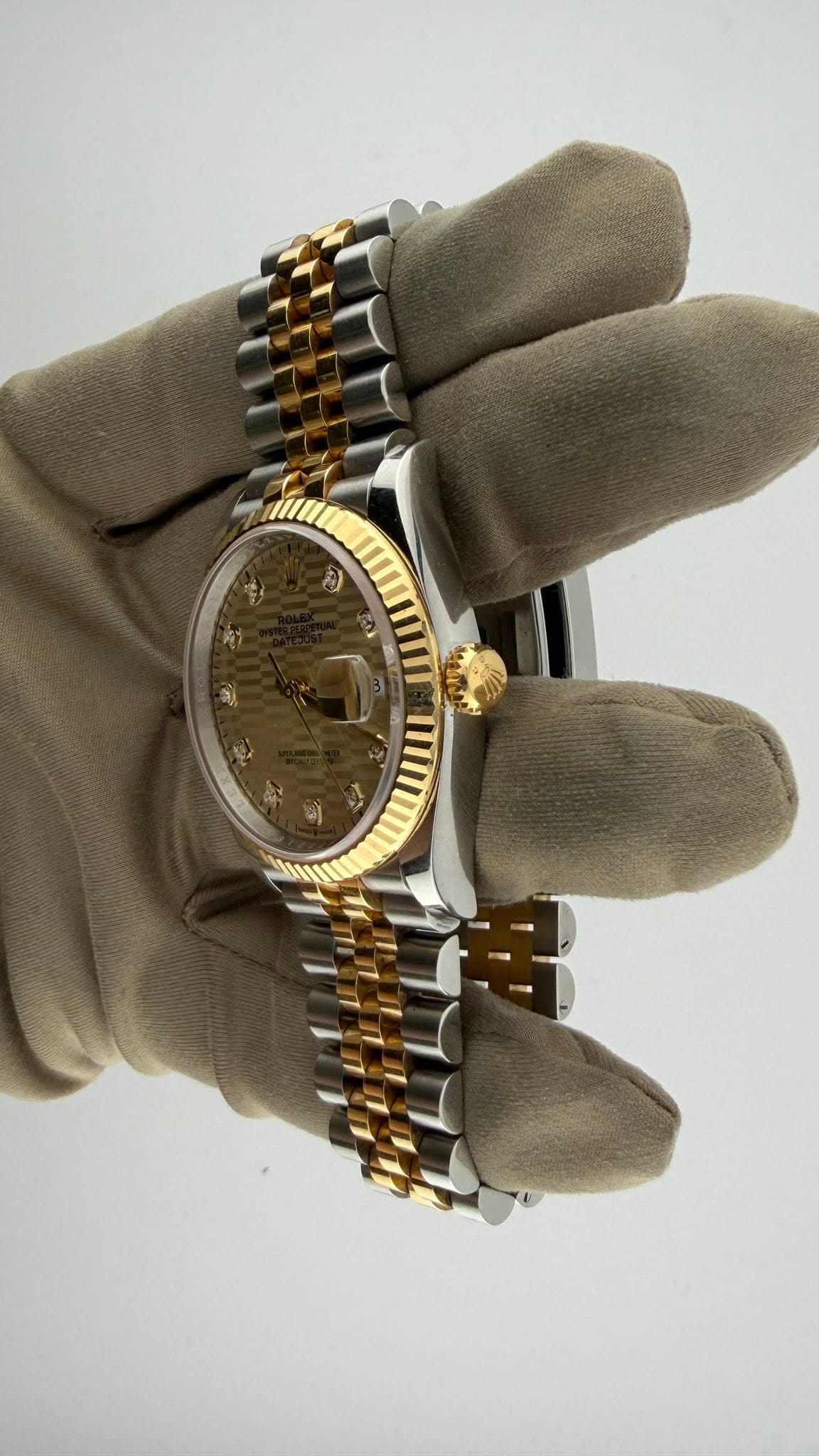 May be an image of wrist watch and text