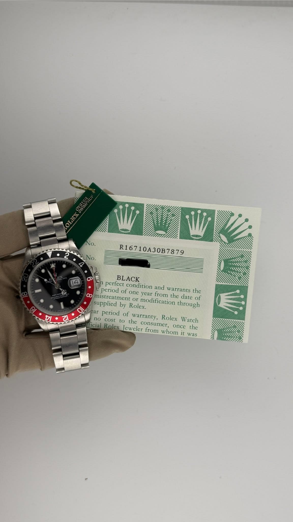 May be an image of wrist watch and text that says 'No. R16710A30B7879 BLACK perfect pee condition and warrants the penodo period.ofone.ye.fomn ofone from CO mistreatment nent…