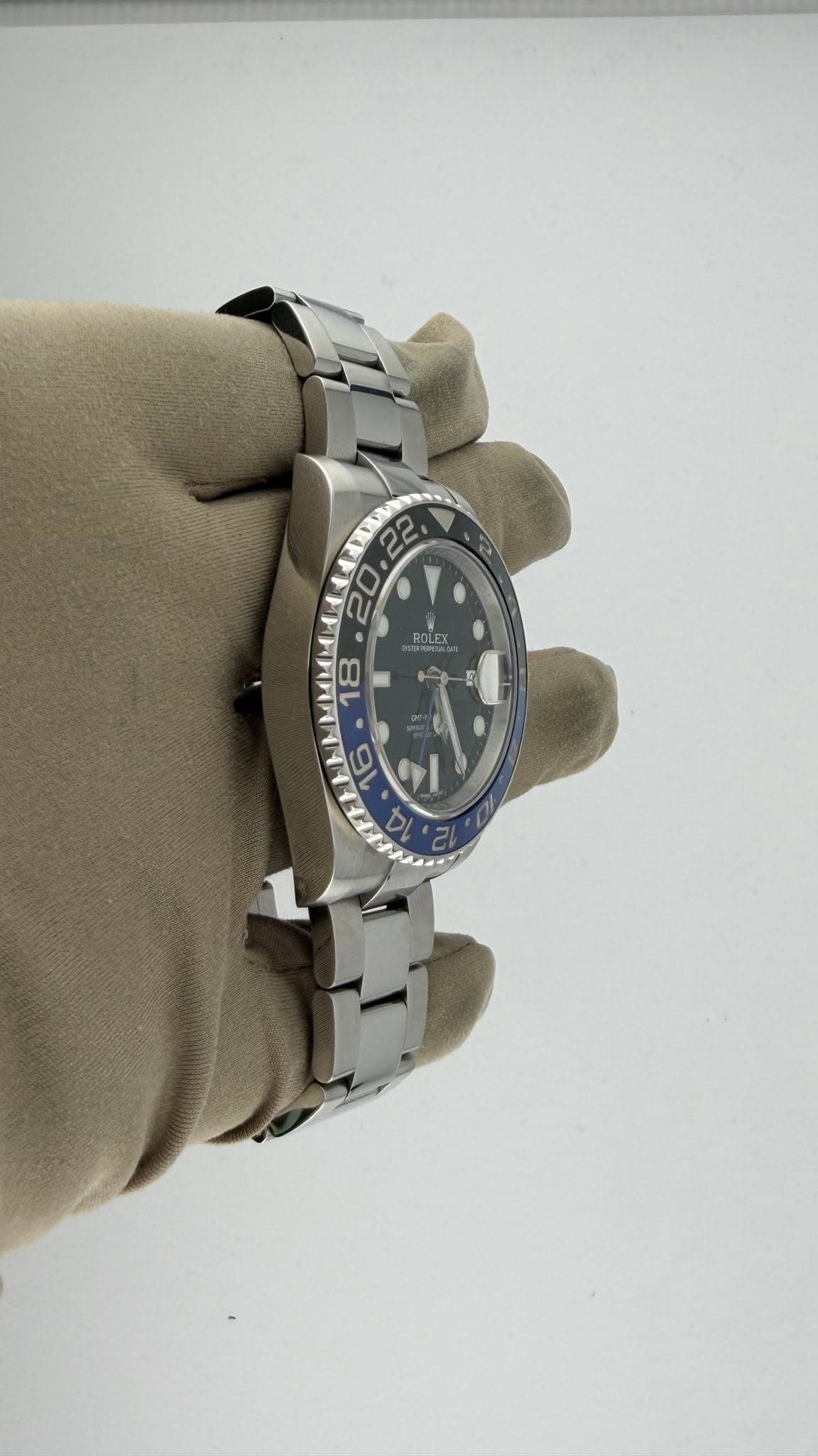 May be an image of wrist watch and text