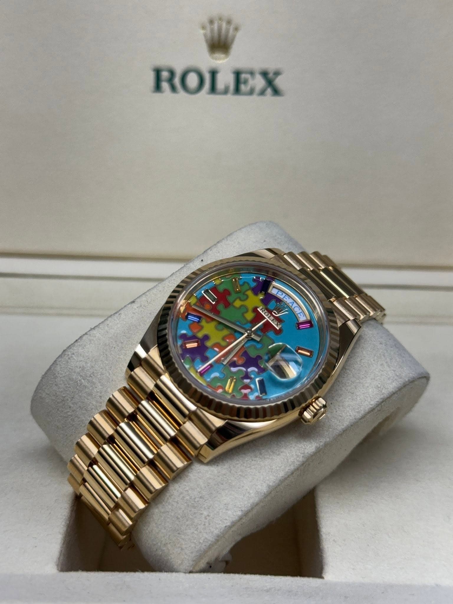 May be an image of wrist watch and text