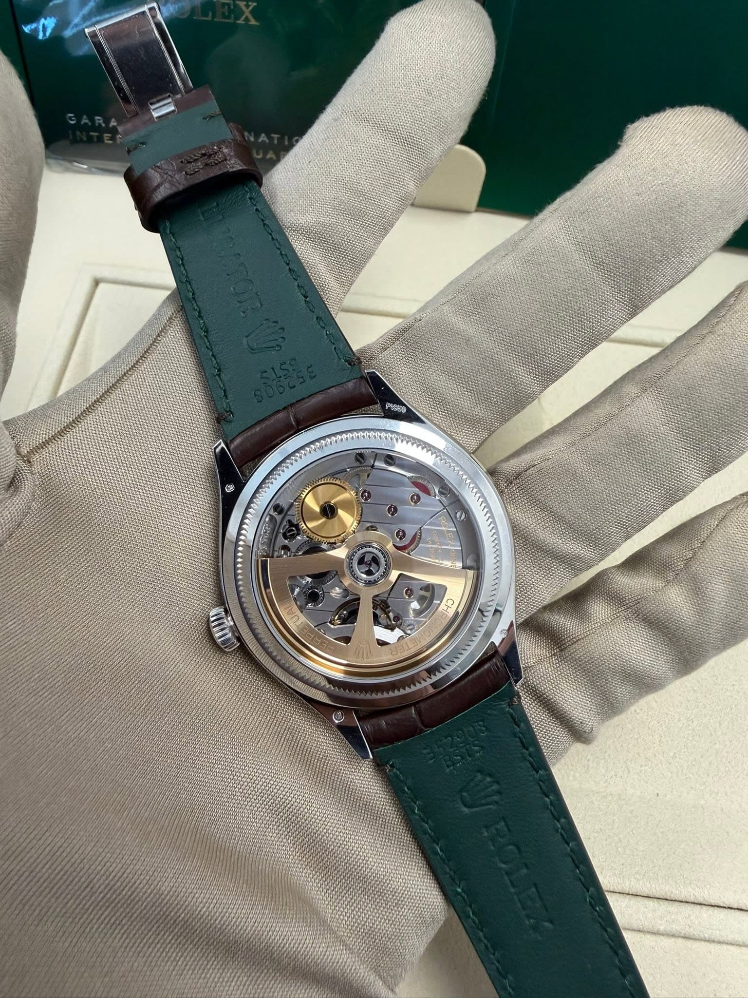 May be an image of wrist watch and text
