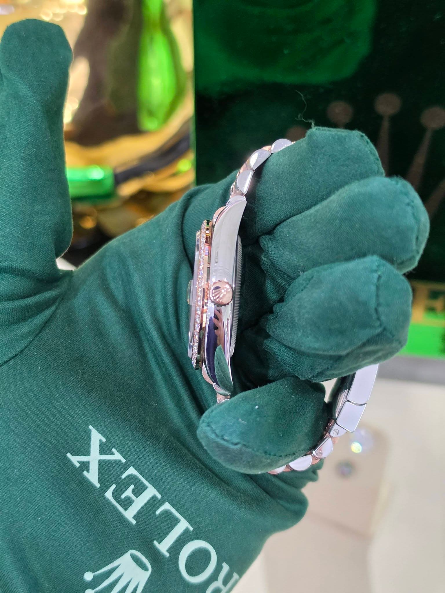 May be an image of wrist watch and text