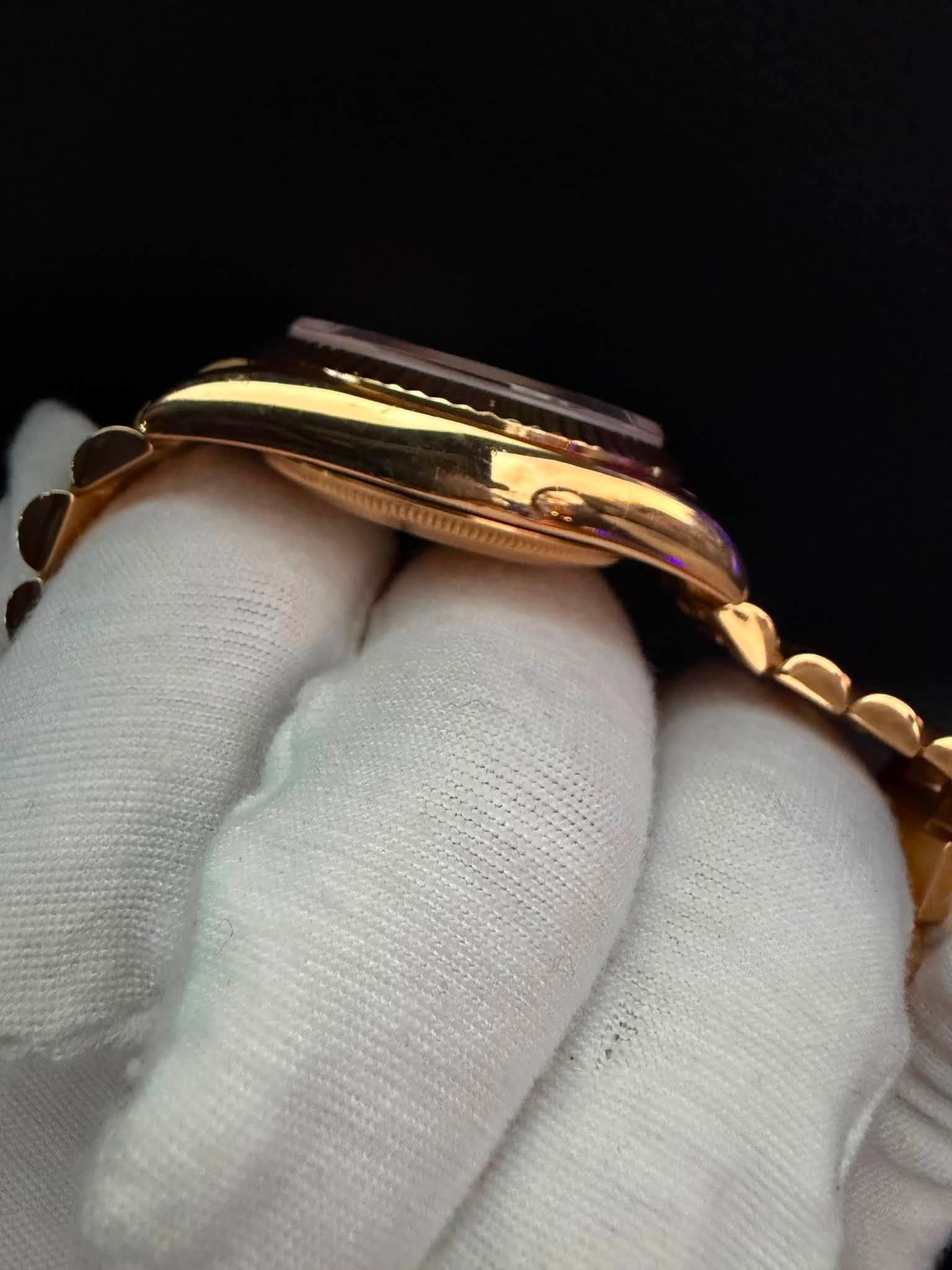 May be an image of jewelry and wrist watch