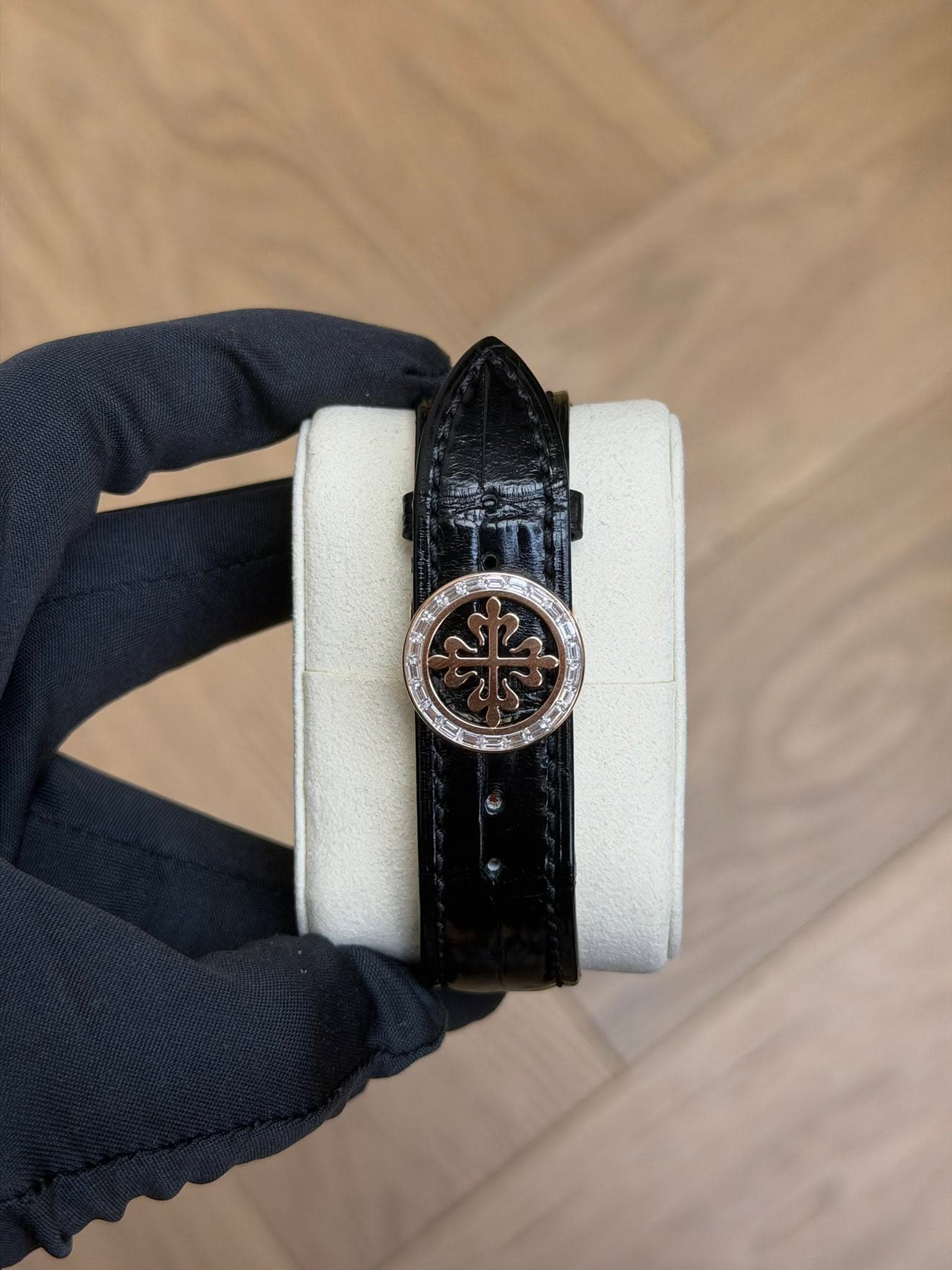 May be an image of wrist watch and text