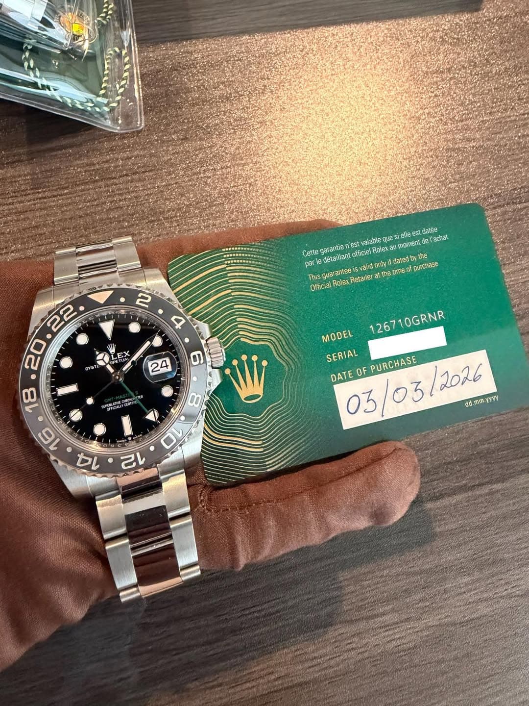 May be an image of wrist watch and text