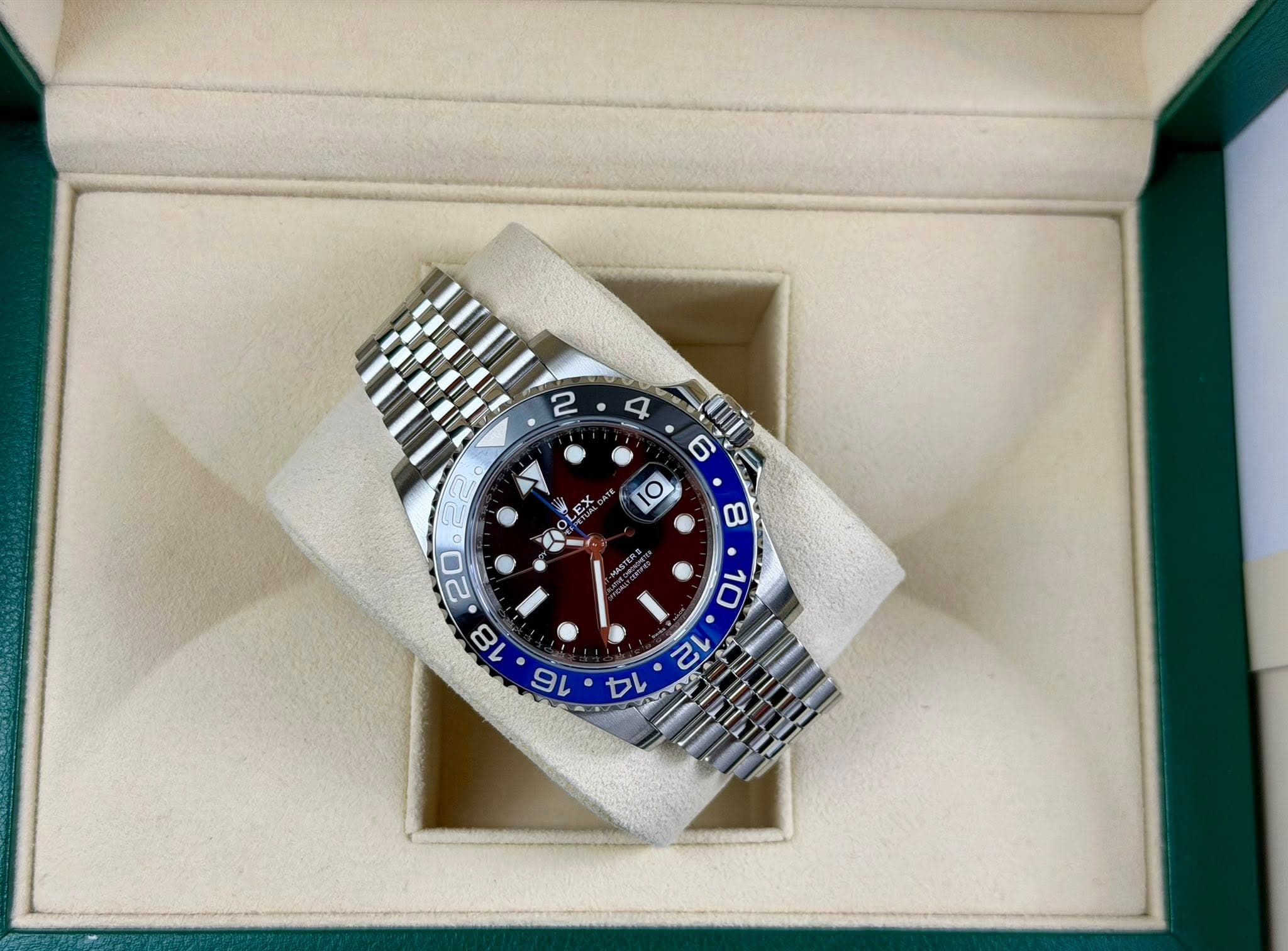 May be an image of wrist watch and text that says '2 4 6 + EX ب BV 16 4'
