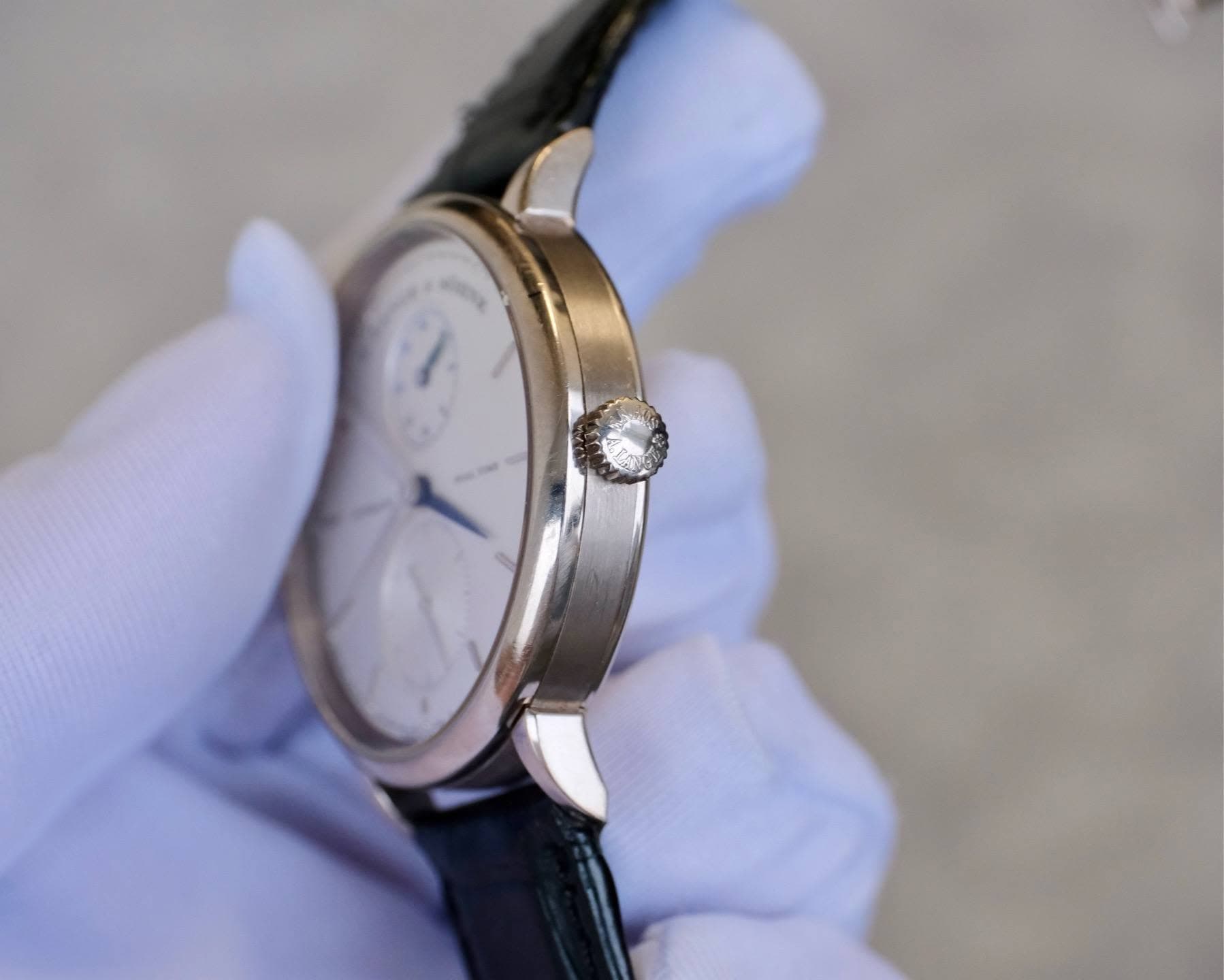 May be an image of wrist watch and text