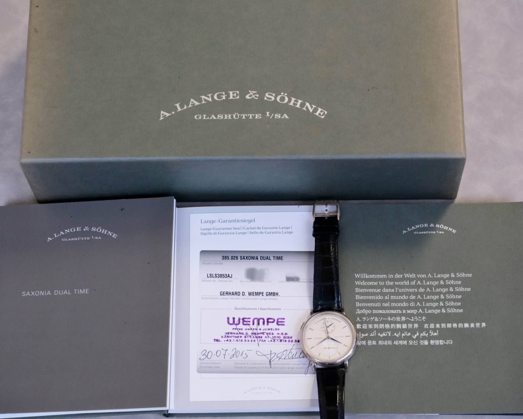 May be an image of wrist watch and text