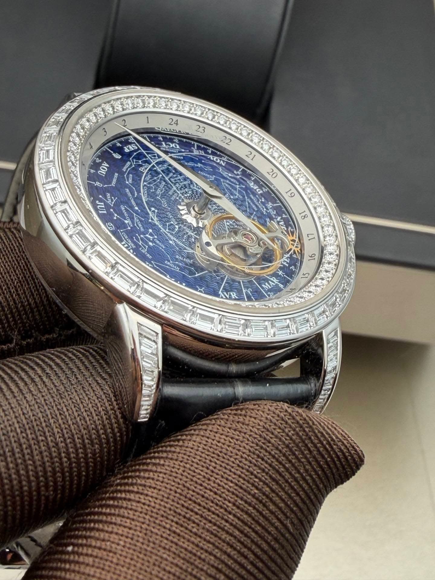 May be an image of wrist watch and text