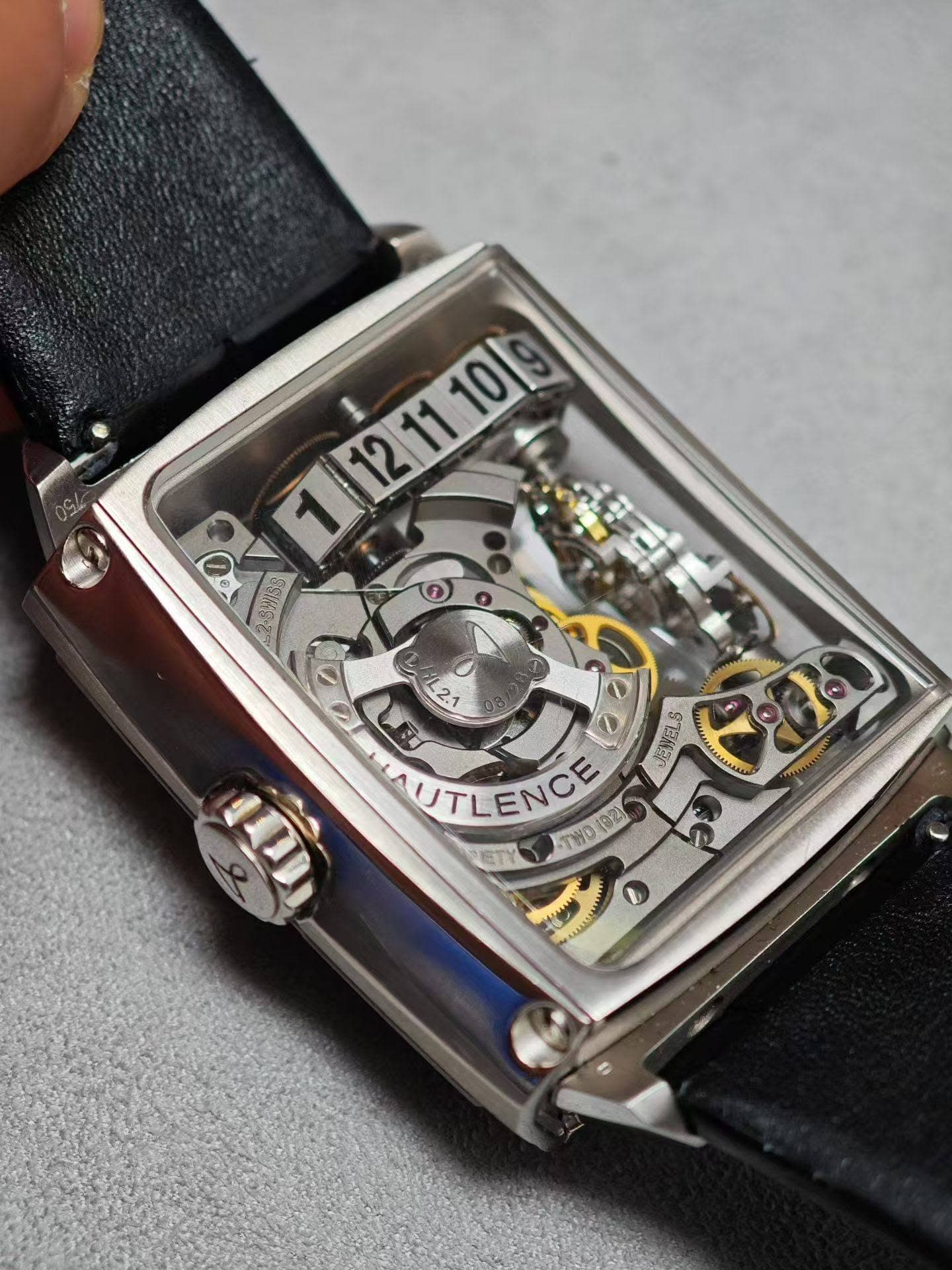 May be an image of wrist watch and text