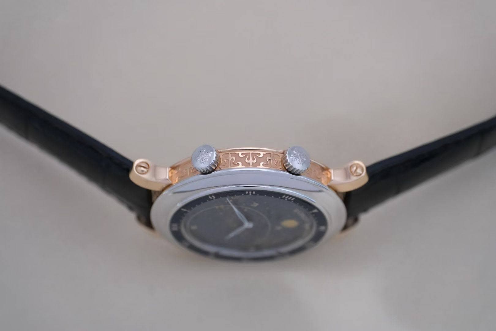 May be an image of wrist watch