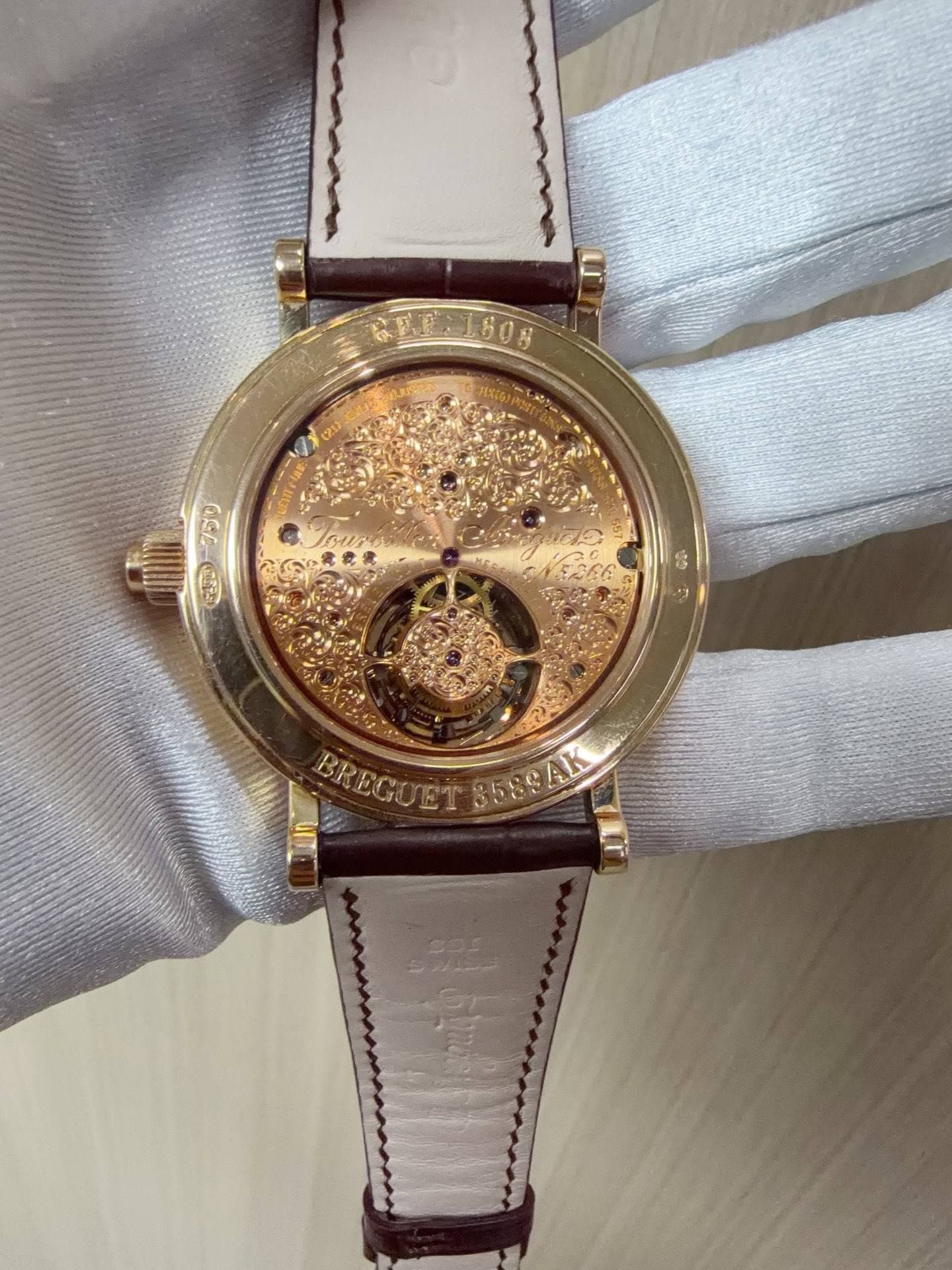 May be an image of wrist watch and text