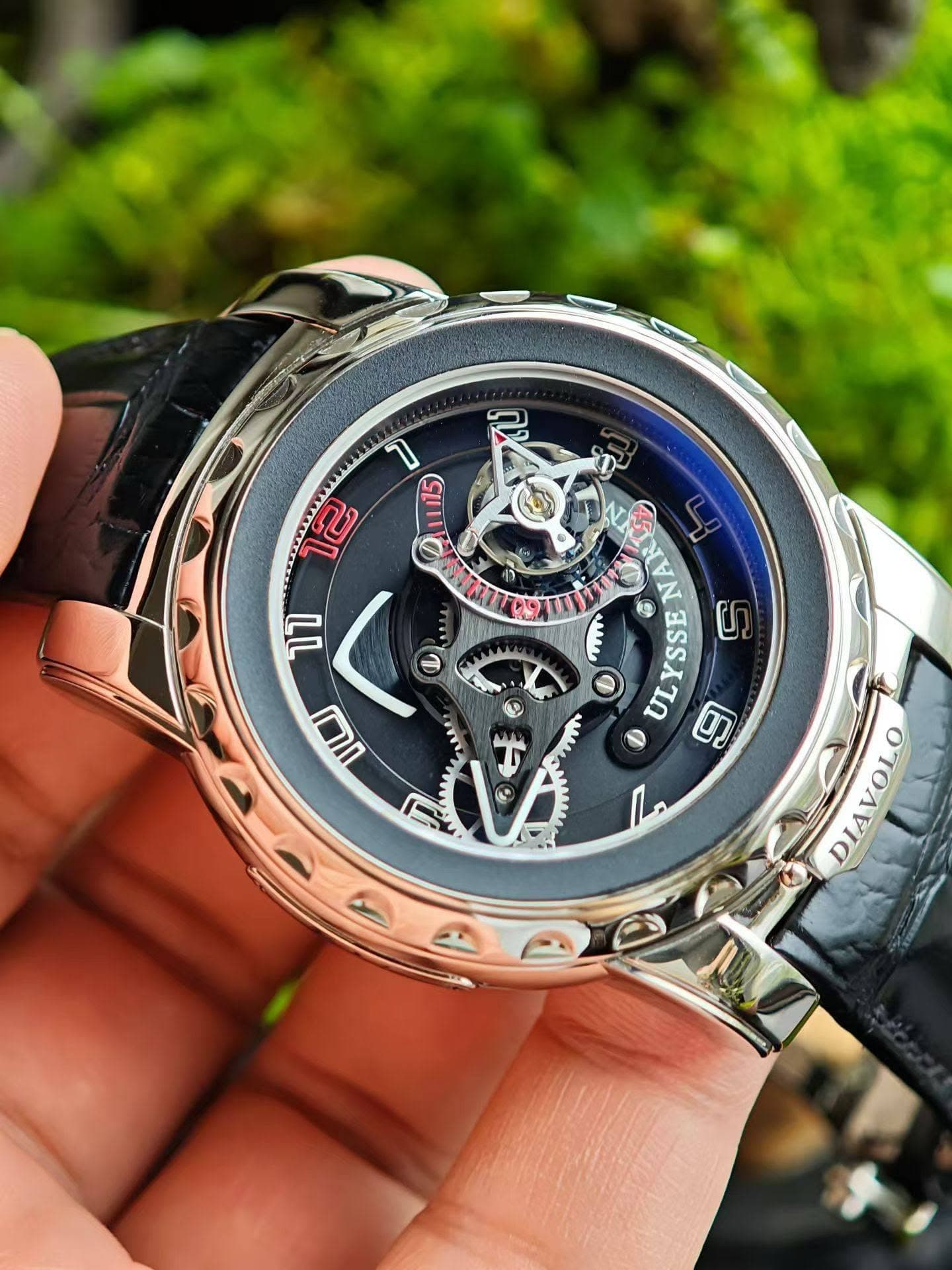 May be an image of wrist watch and text that says 'SL 1115 O ।ਦ LL ጣበ D YSSE S UL ULYSSE 9 D O I ® DIAVOLO DIA VOLO 2 G'