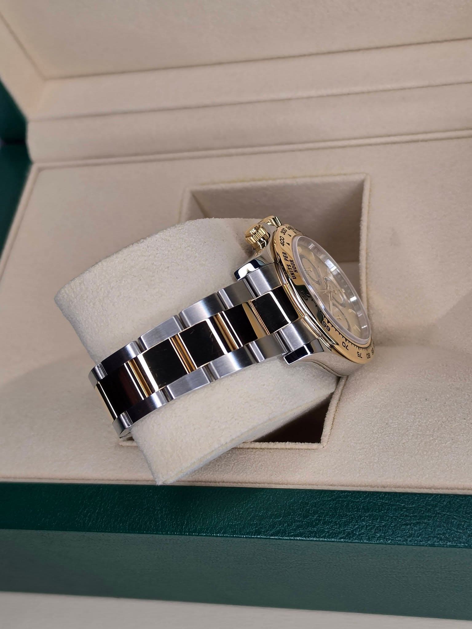 May be an image of wrist watch, ring and text
