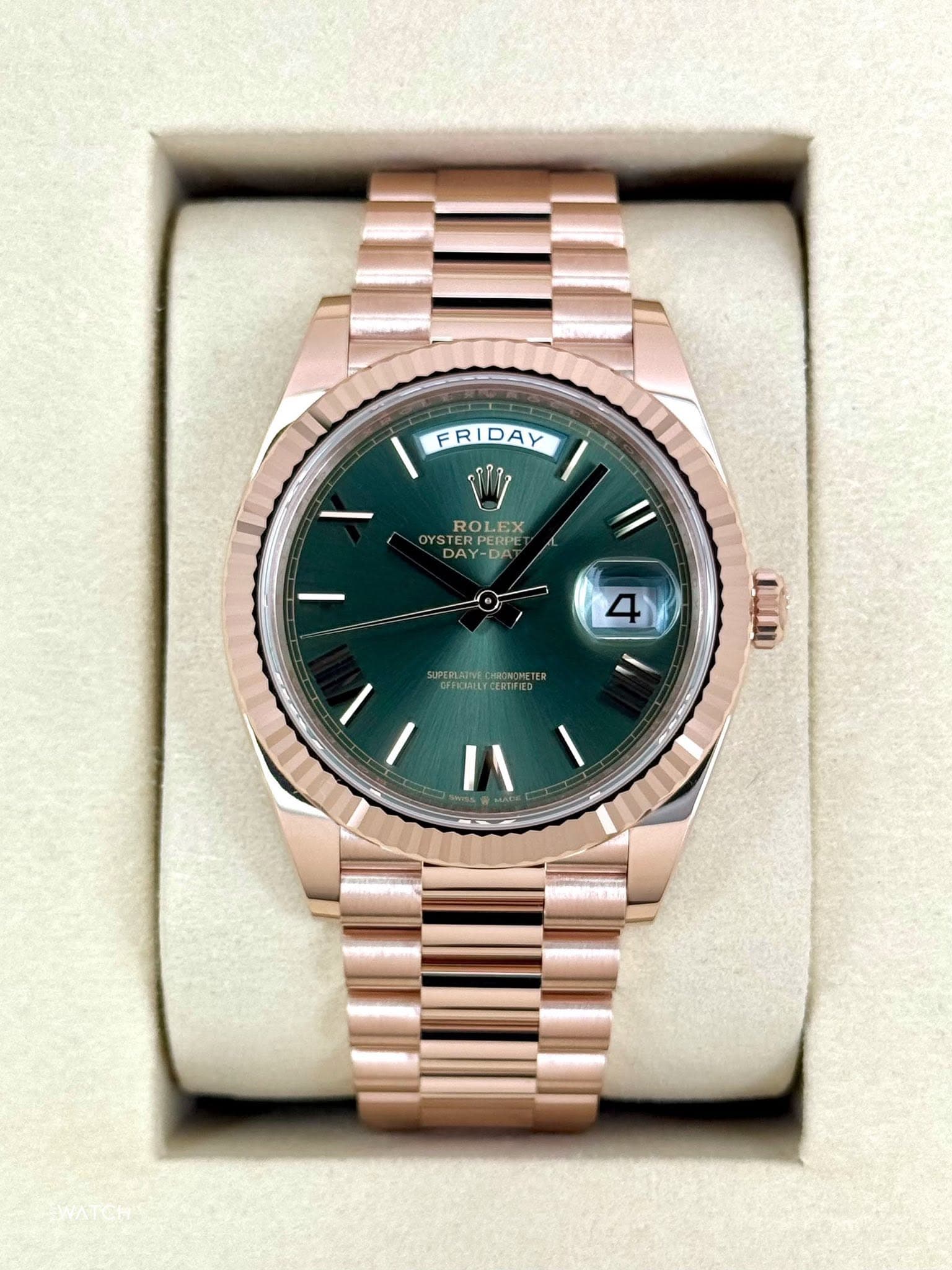 May be an image of wrist watch and text