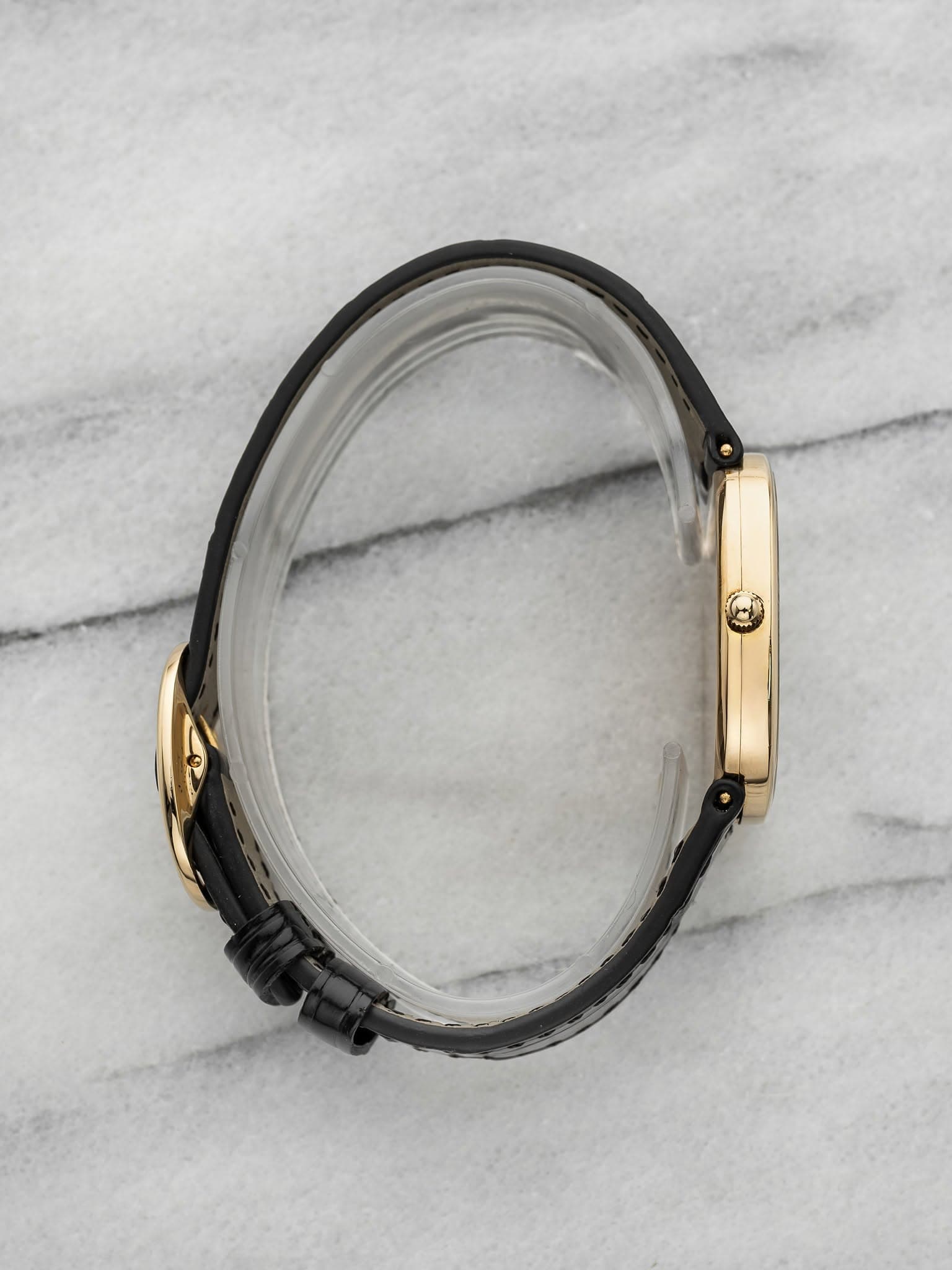 May be an image of jewelry and wrist watch