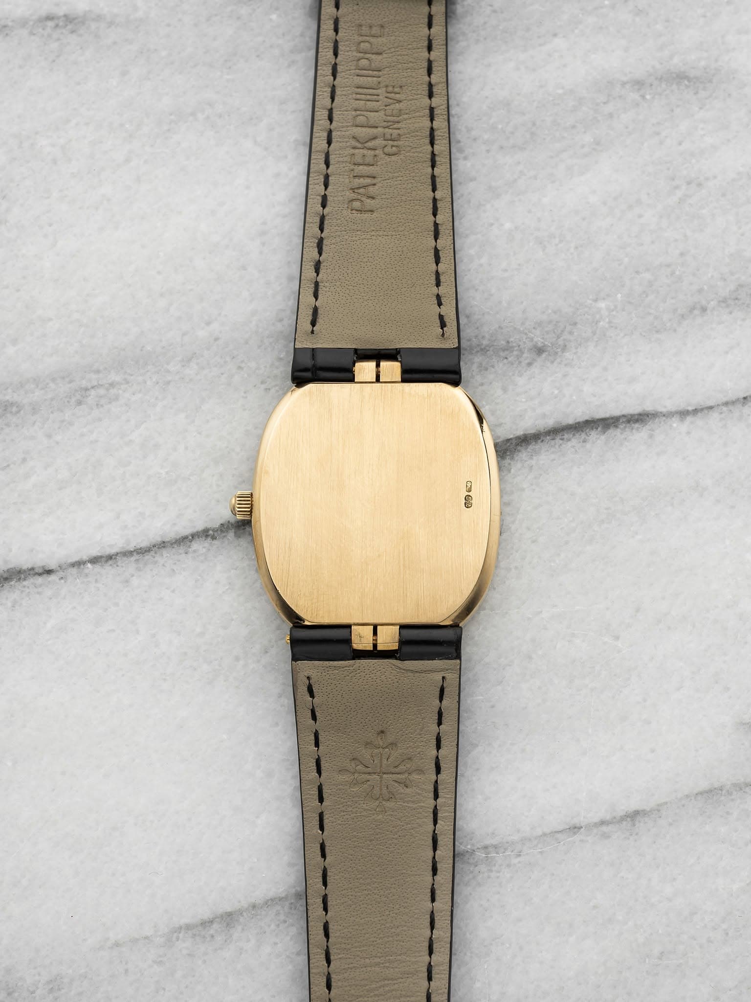 May be an image of wrist watch and leather